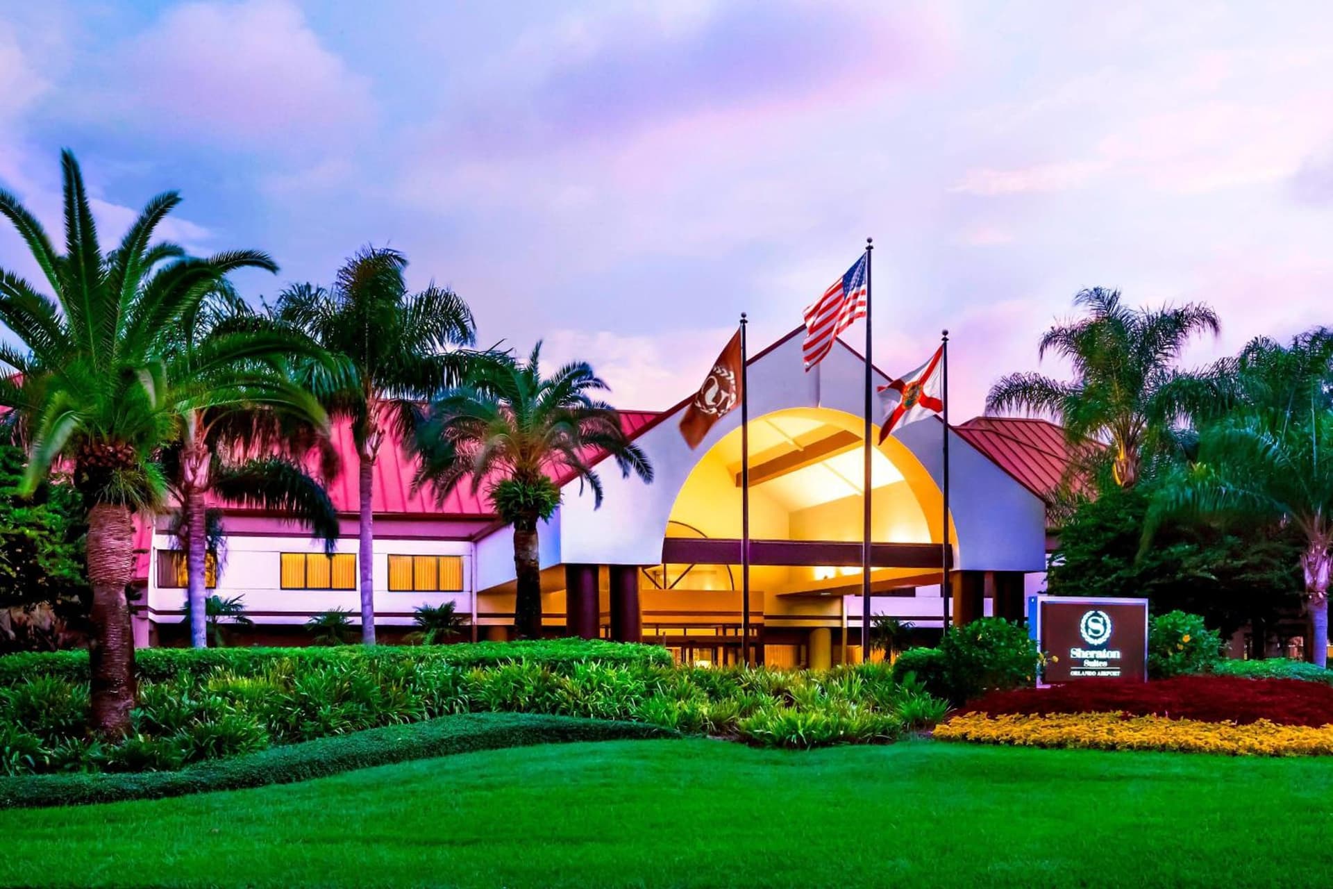 Sheraton Suites Orlando Airport Hotel featured exterior or lobby in Orlando, FL — similar hotel