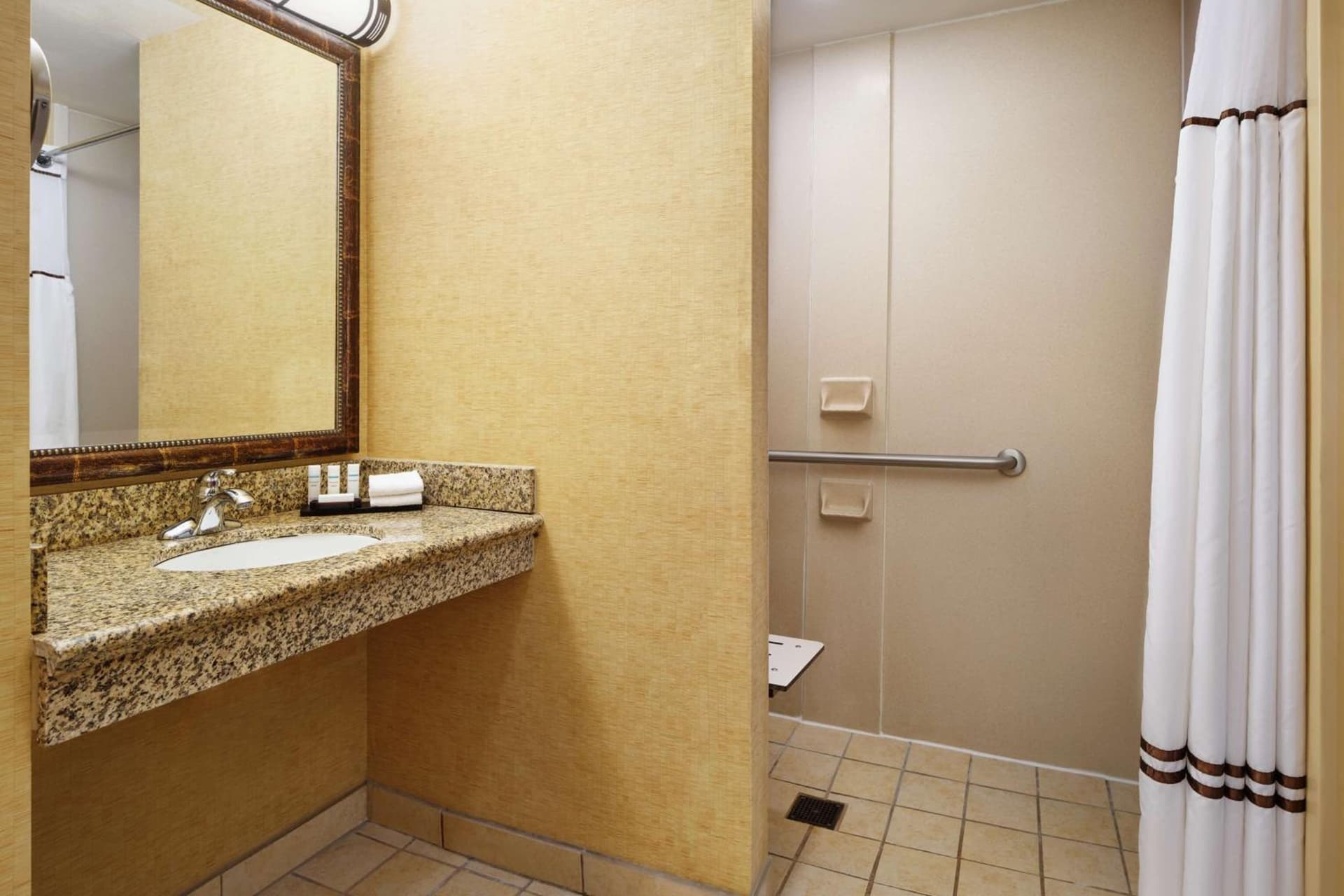 Embassy Suites by Hilton Charlotte Concord Golf Resort & Spa interior in Concord, NC — gallery photo 2