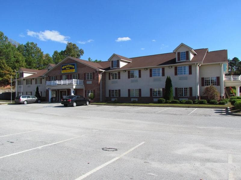 Western Inn & Suites Hampton featured exterior or lobby in Hampton, GA — similar hotel