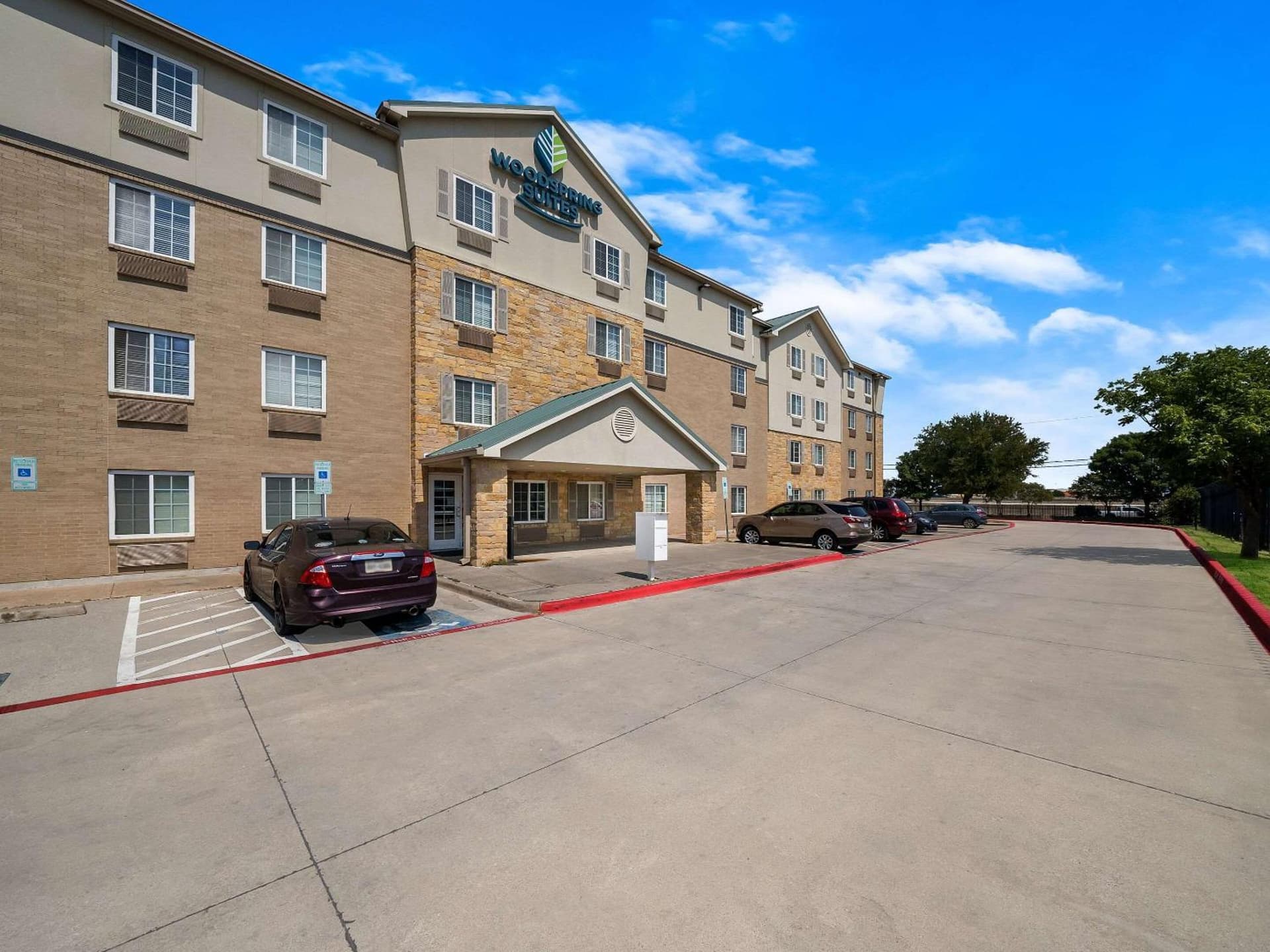 WoodSpring Suites Dallas Rockwall featured exterior or lobby in Rockwall, TX — similar hotel