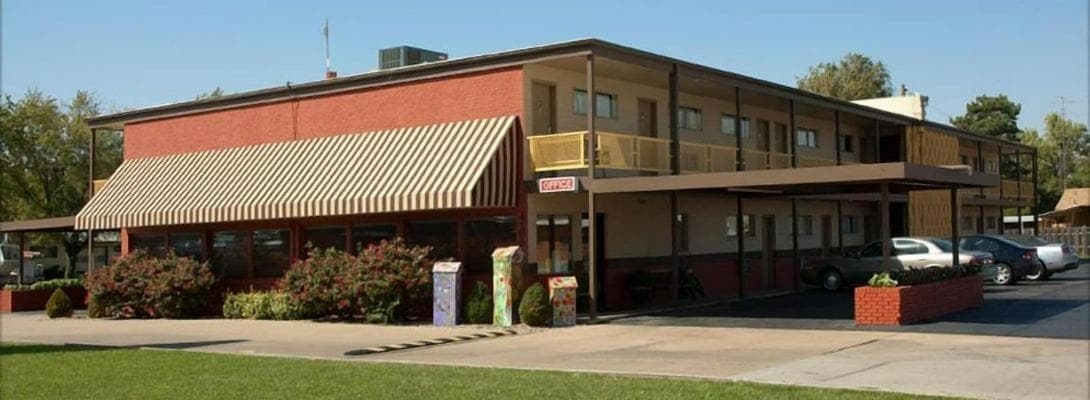 Big Bend Traveler's Inn featured exterior or lobby in Great Bend, KS — similar hotel