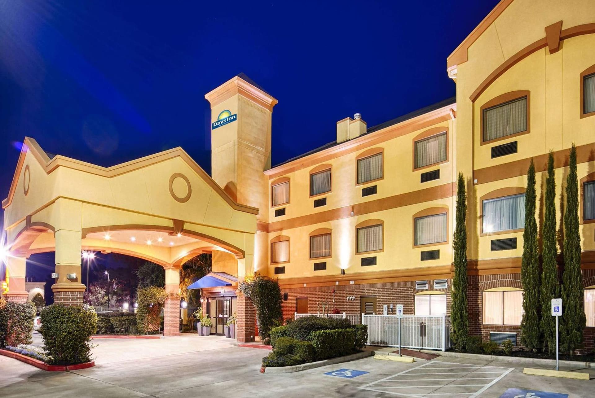 Days Inn & Suites by Wyndham Sam Houston Tollway featured exterior or lobby in Houston, TX — similar hotel