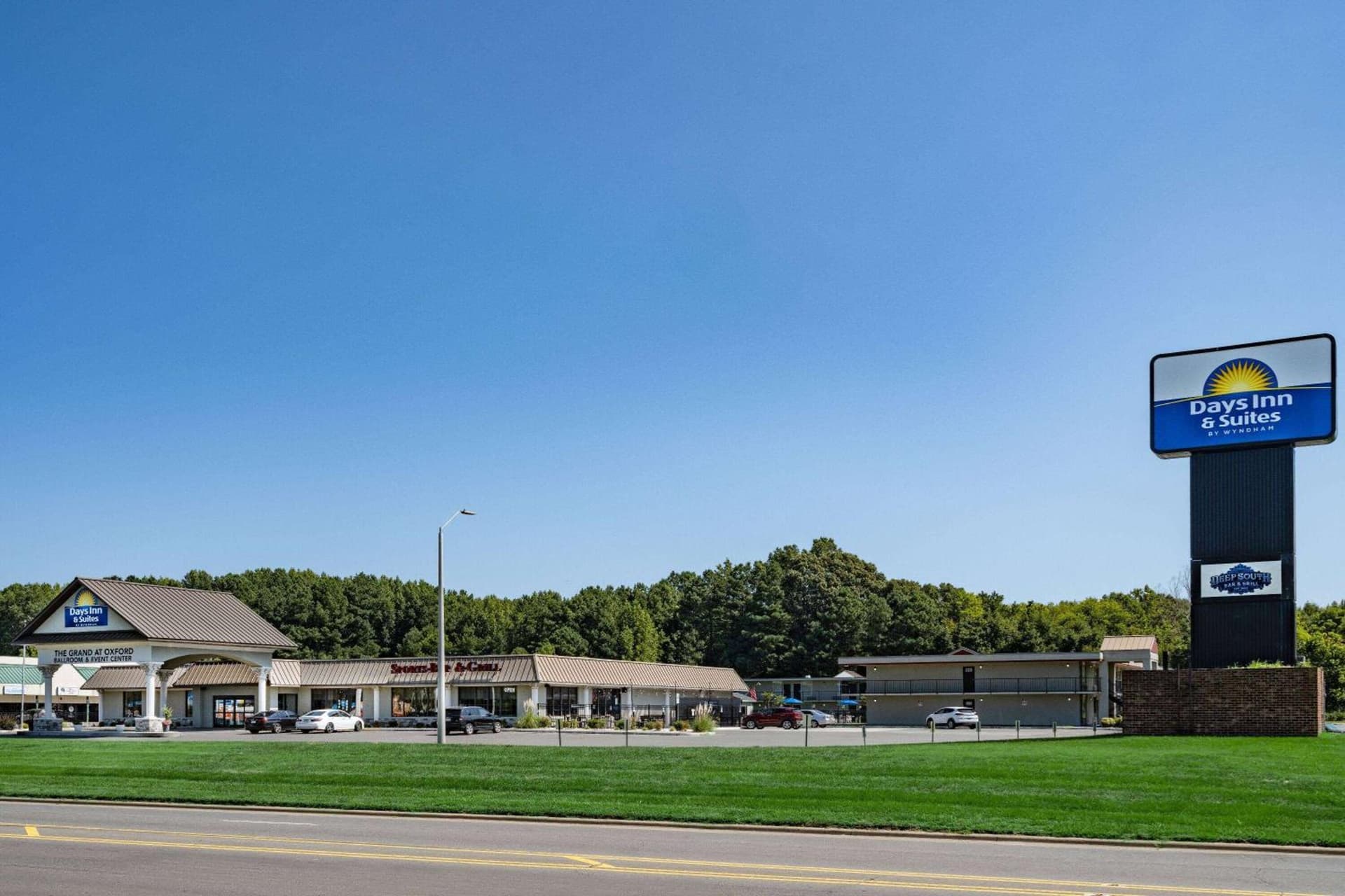 Days Inn and Suites by Wyndham Oxford featured exterior or lobby in Oxford, NC — similar hotel