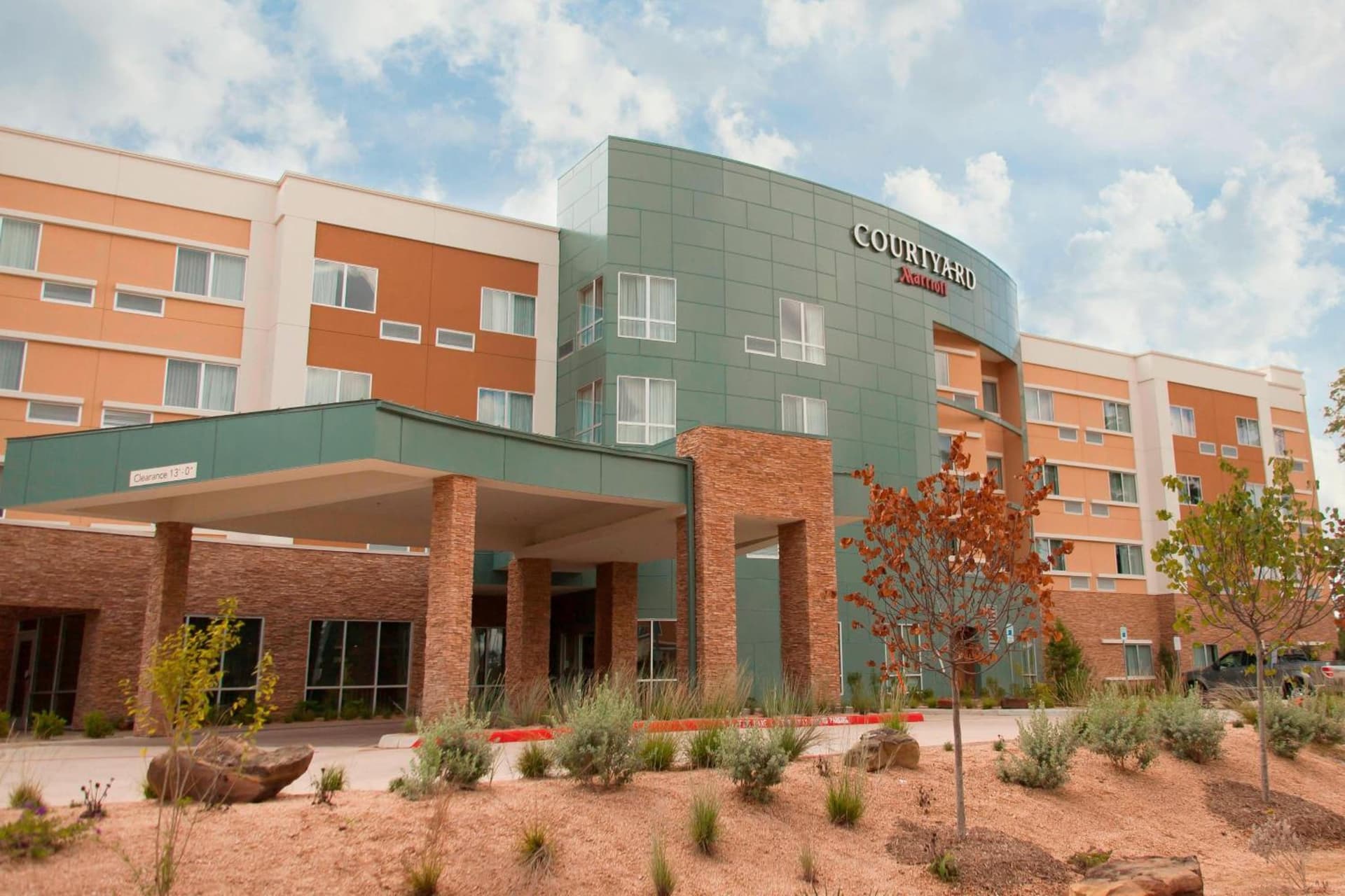 Courtyard by Marriott Houston City Place featured exterior or lobby in Spring, TX — similar hotel