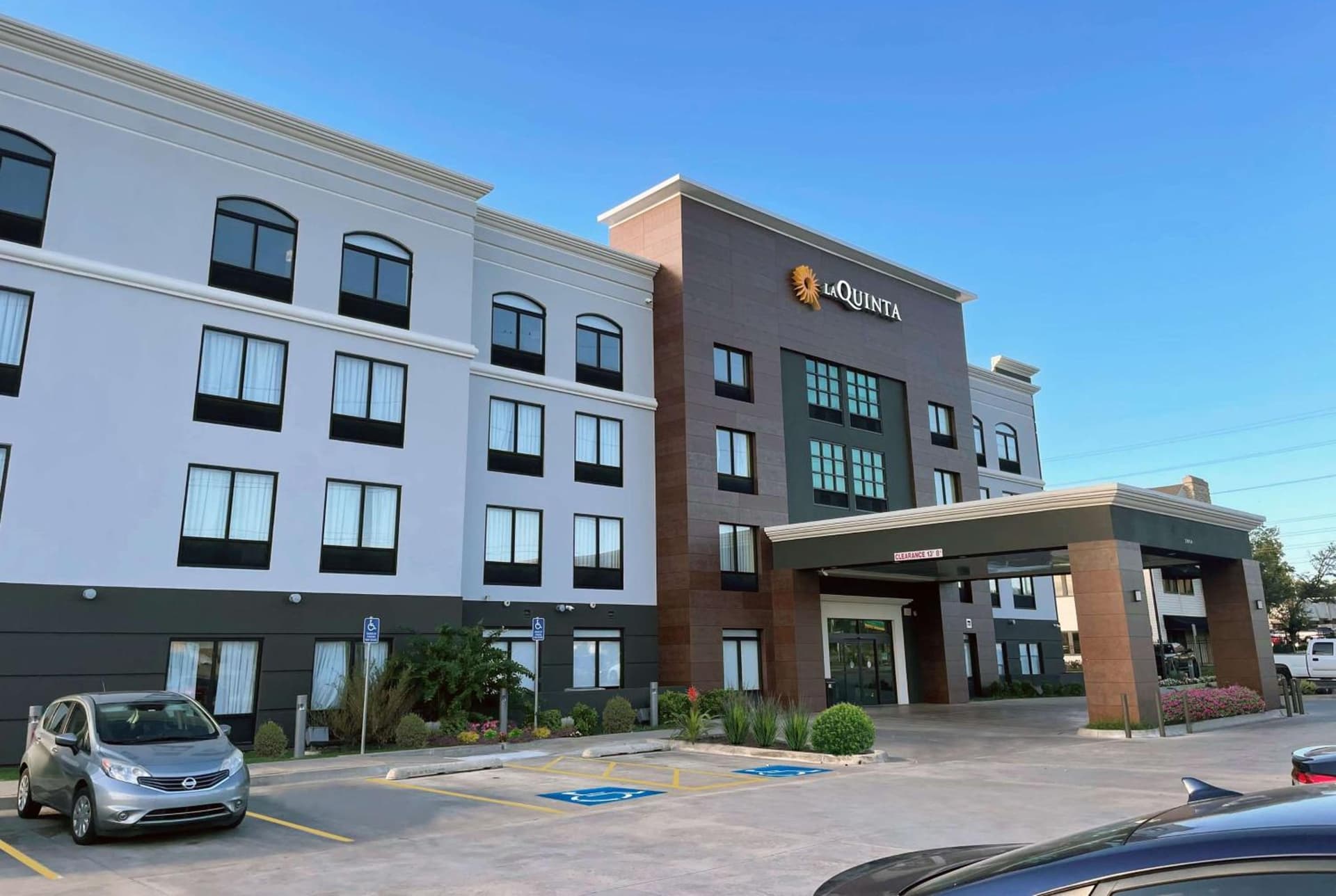 La Quinta Inn & Suites by Wyndham Tulsa Midtown featured exterior or lobby in Tulsa, OK — similar hotel