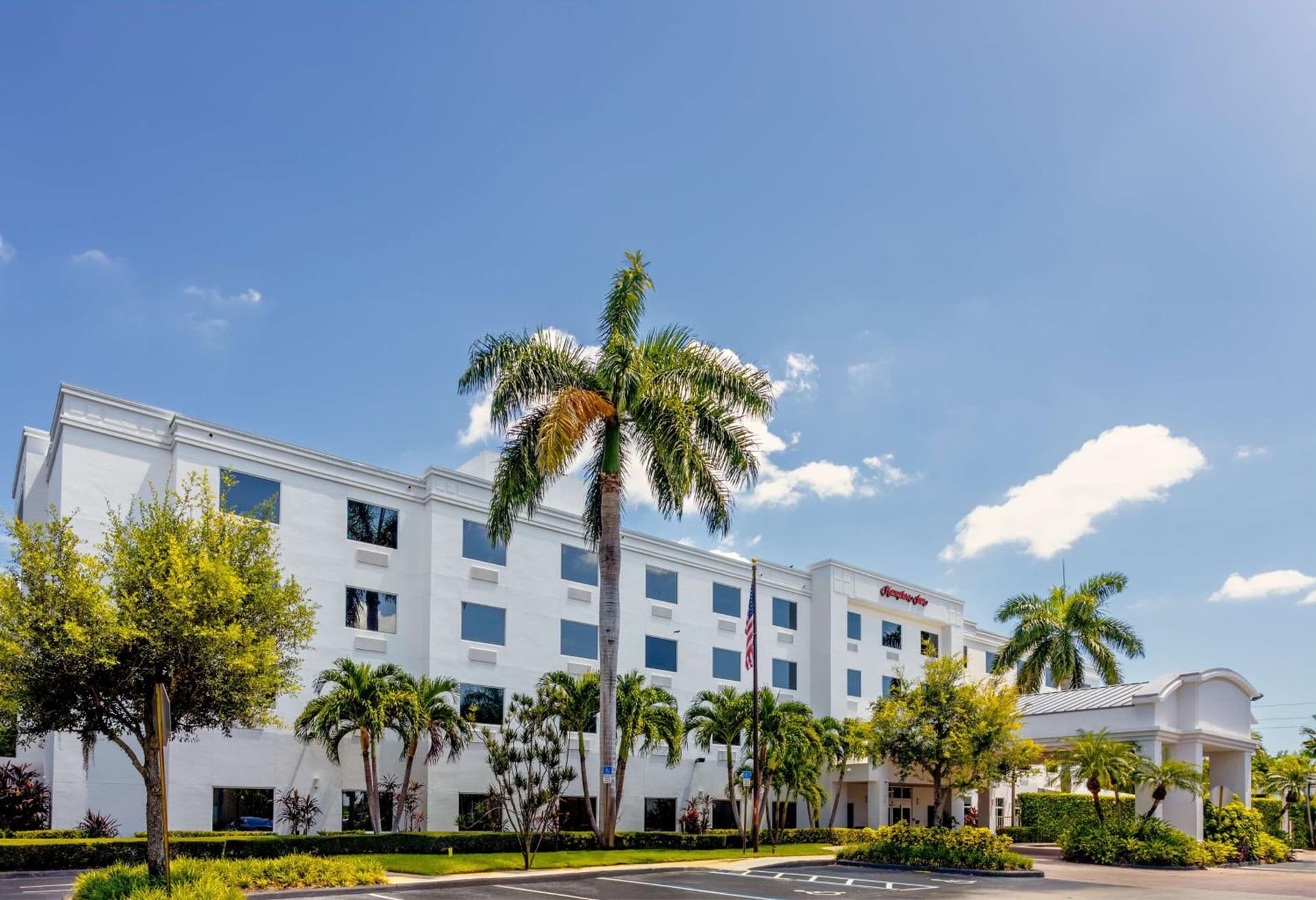 Hampton Inn West Palm Beach-Lake Worth-Turnpike featured exterior or lobby in Lake Worth — similar hotel