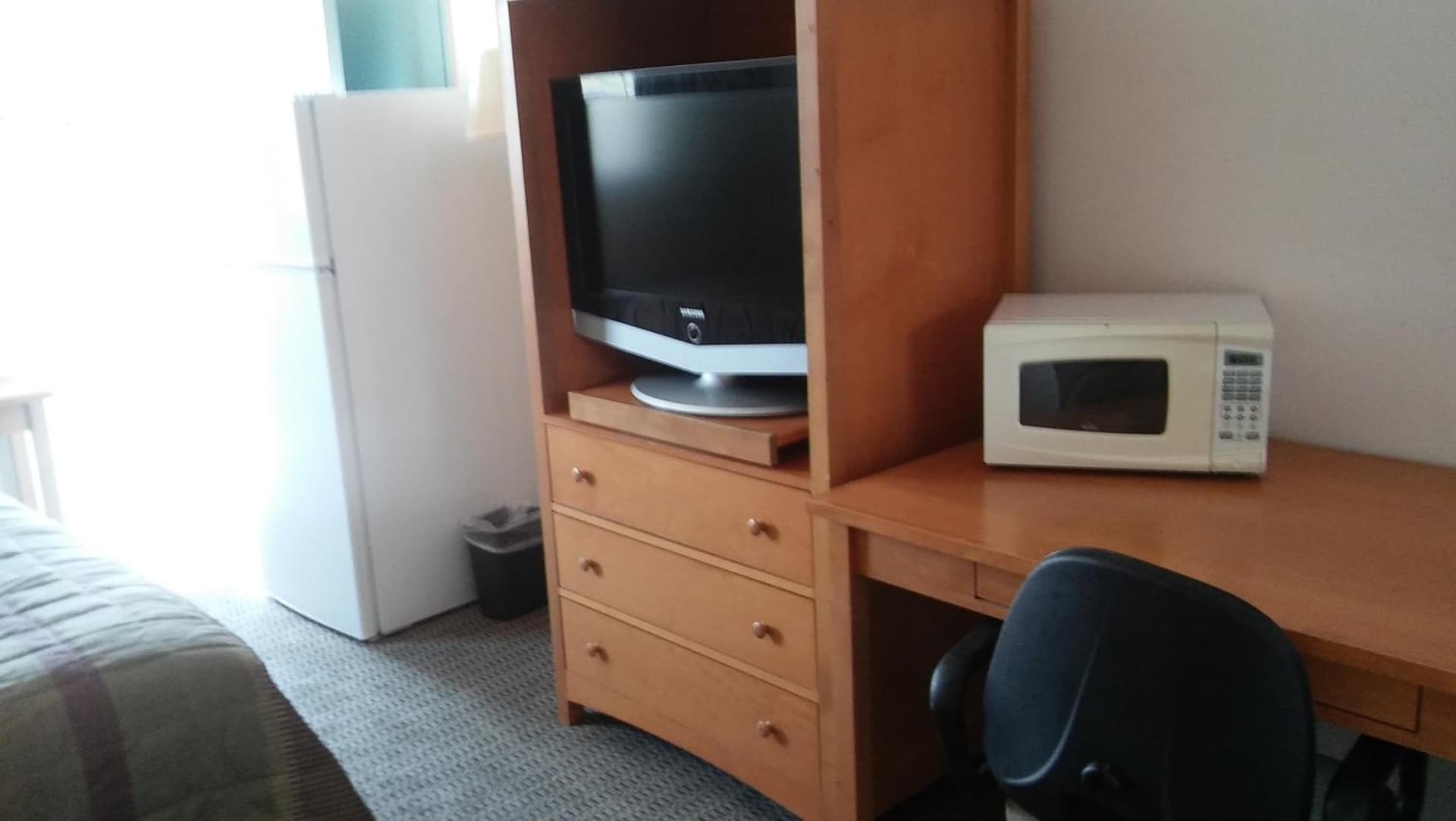 Studio Apartments featured exterior or lobby in Sterling, CO — similar hotel