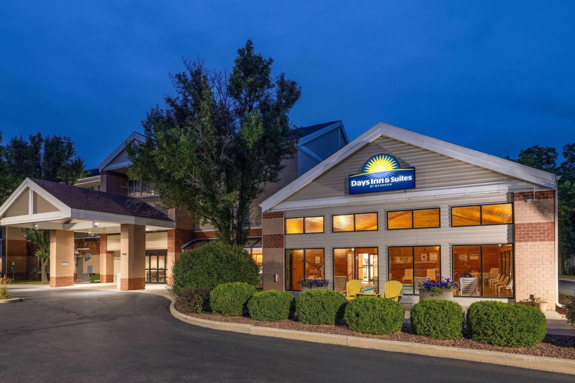 Days Inn & Suites by Wyndham Madison featured exterior or lobby in Madison, WI — similar hotel