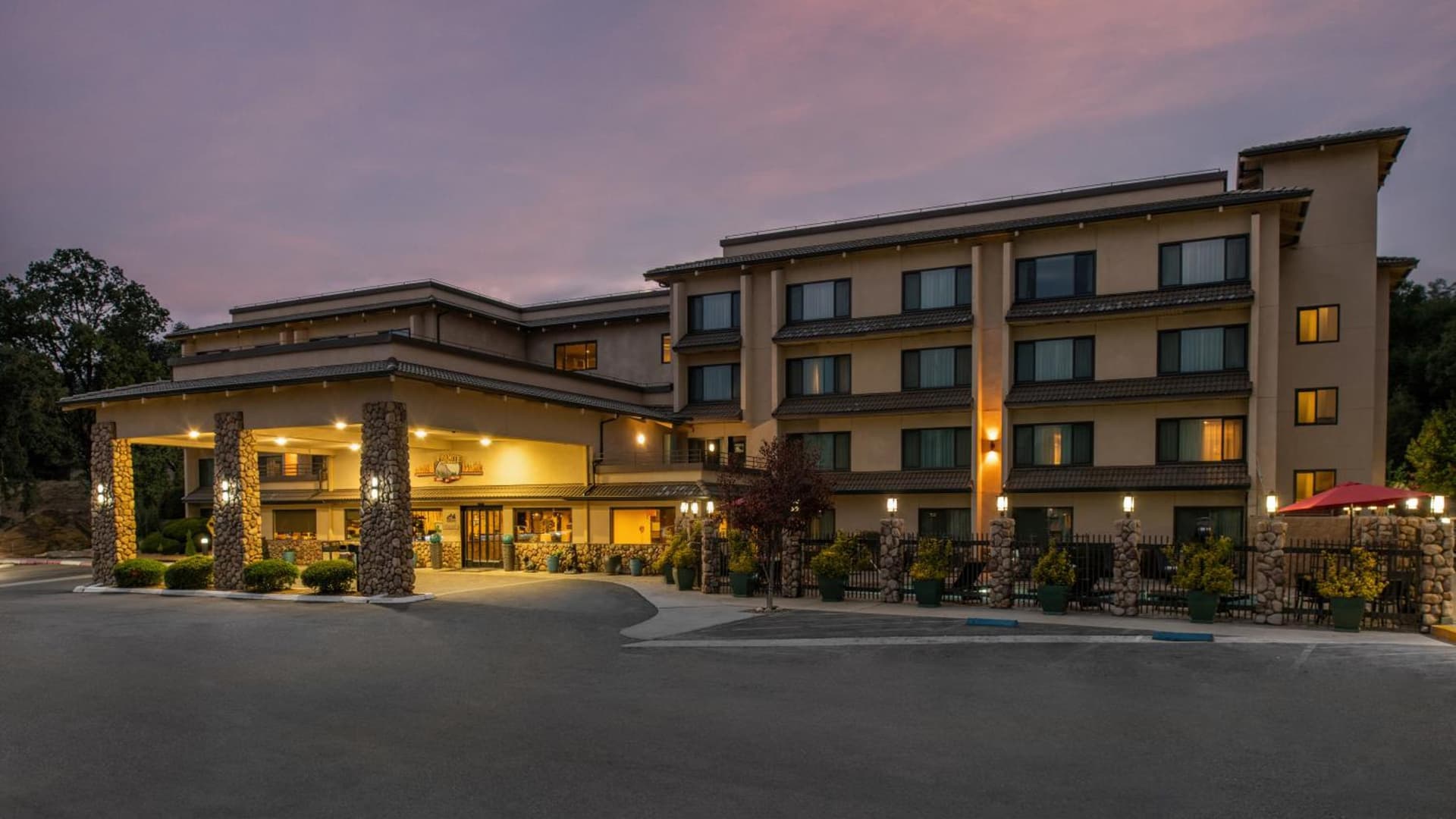 Yosemite Southgate Hotel & Suites exterior or lobby in Oakhurst, CA — main listing photo