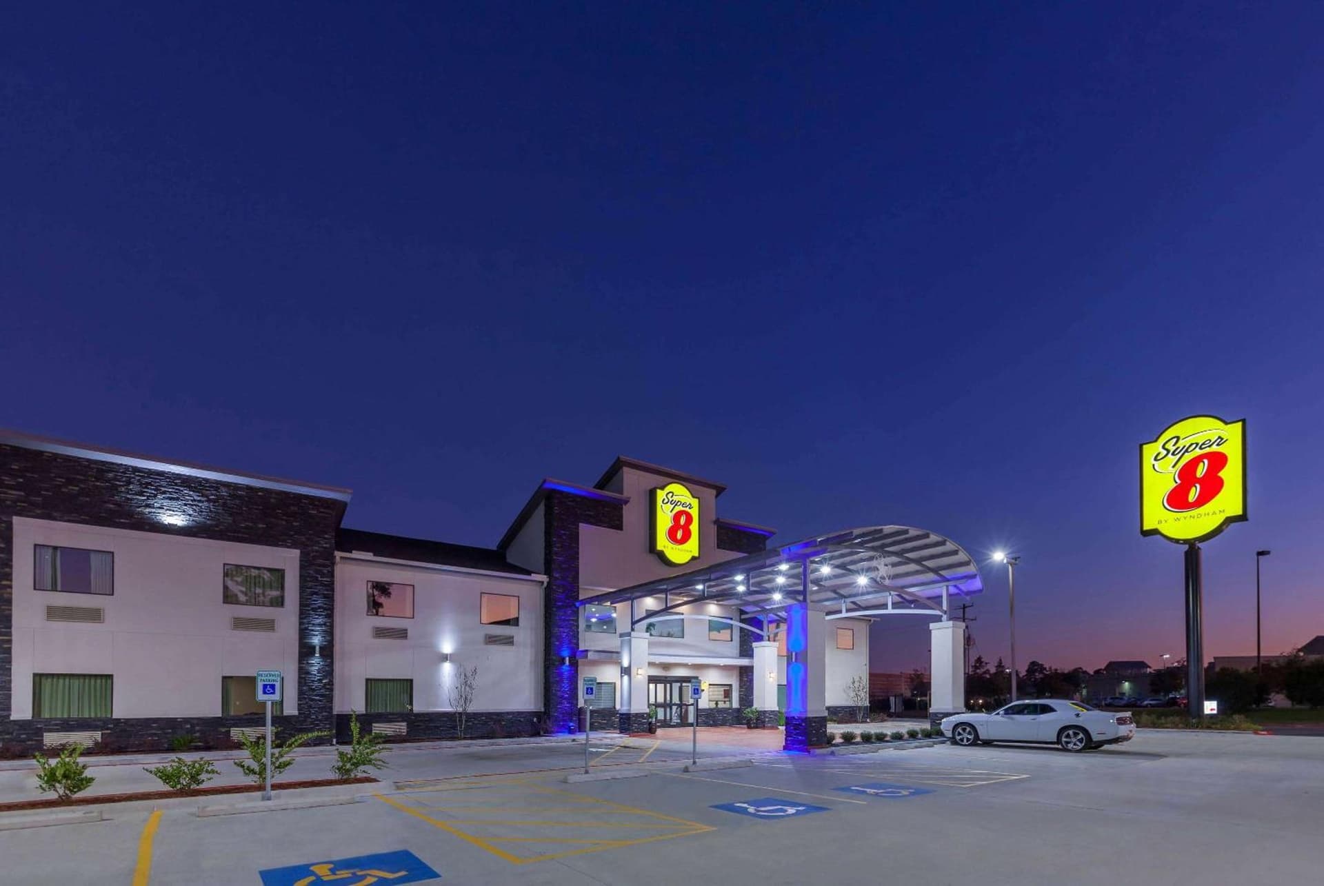 Super 8 by Wyndham Kingwood Houston North featured exterior or lobby in Kingwood, TX — similar hotel
