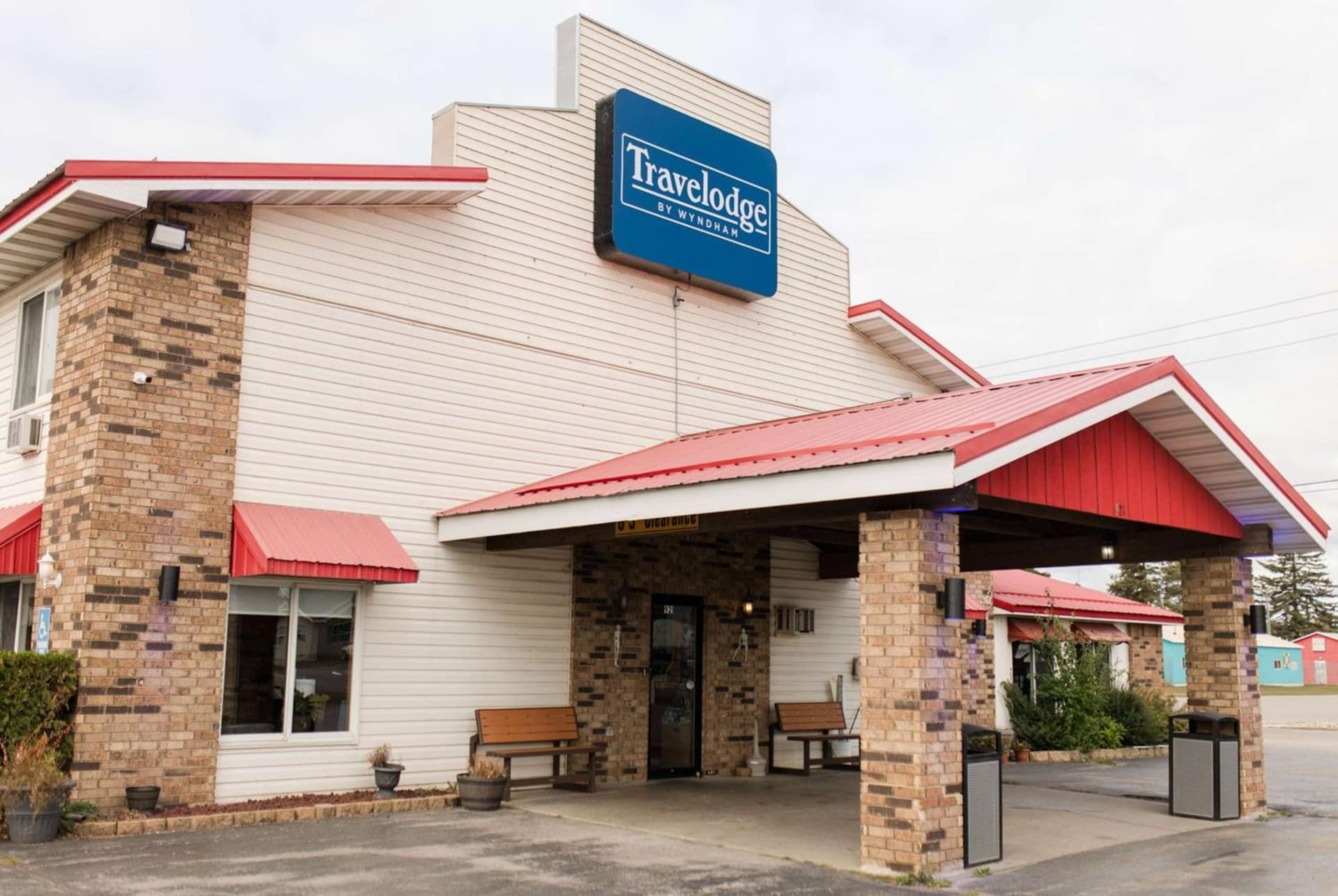 Travelodge by Wyndham Escanaba featured exterior or lobby in Escanaba, MI — similar hotel