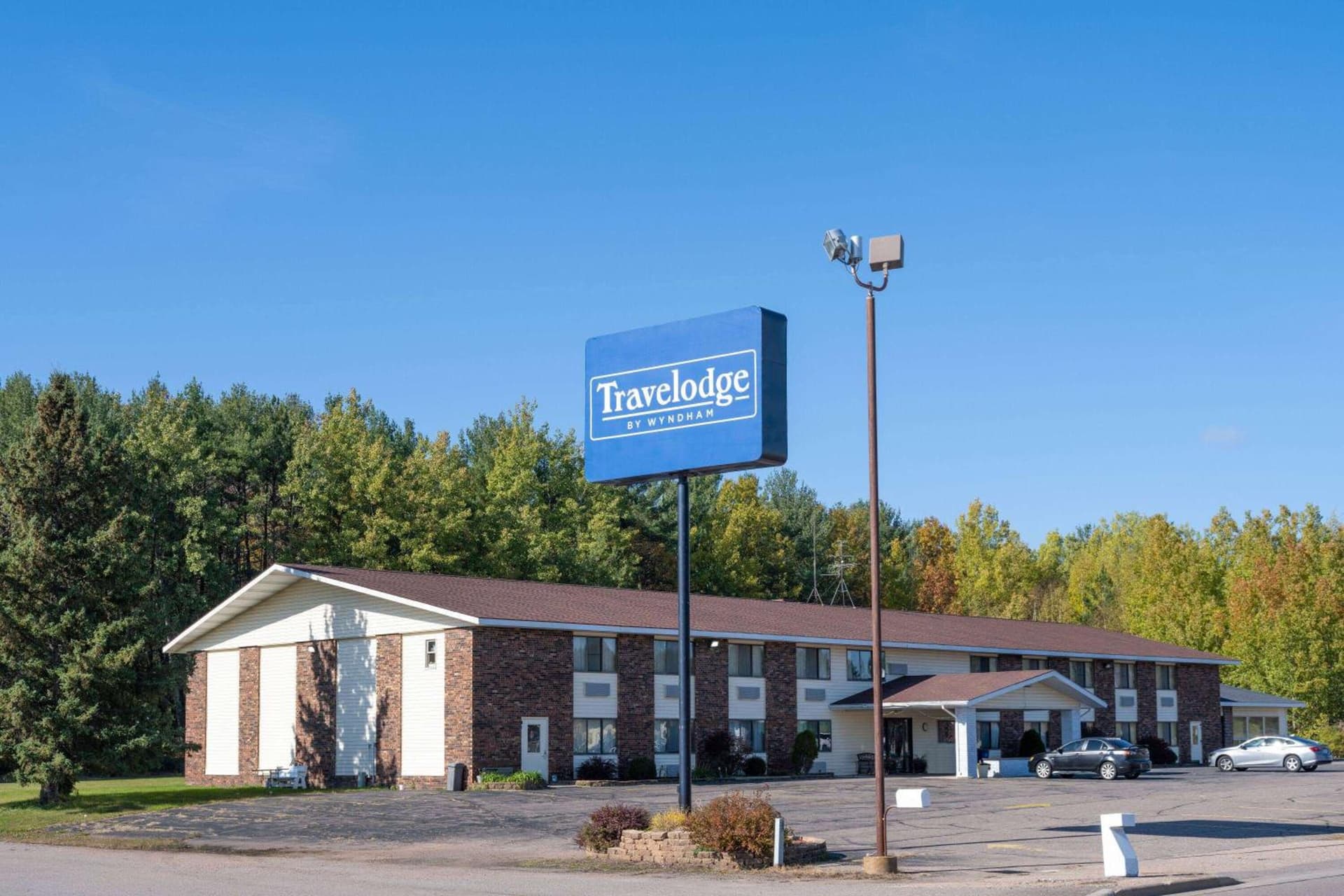 Travelodge by Wyndham Merrill featured exterior or lobby in Merrill, WI — similar hotel