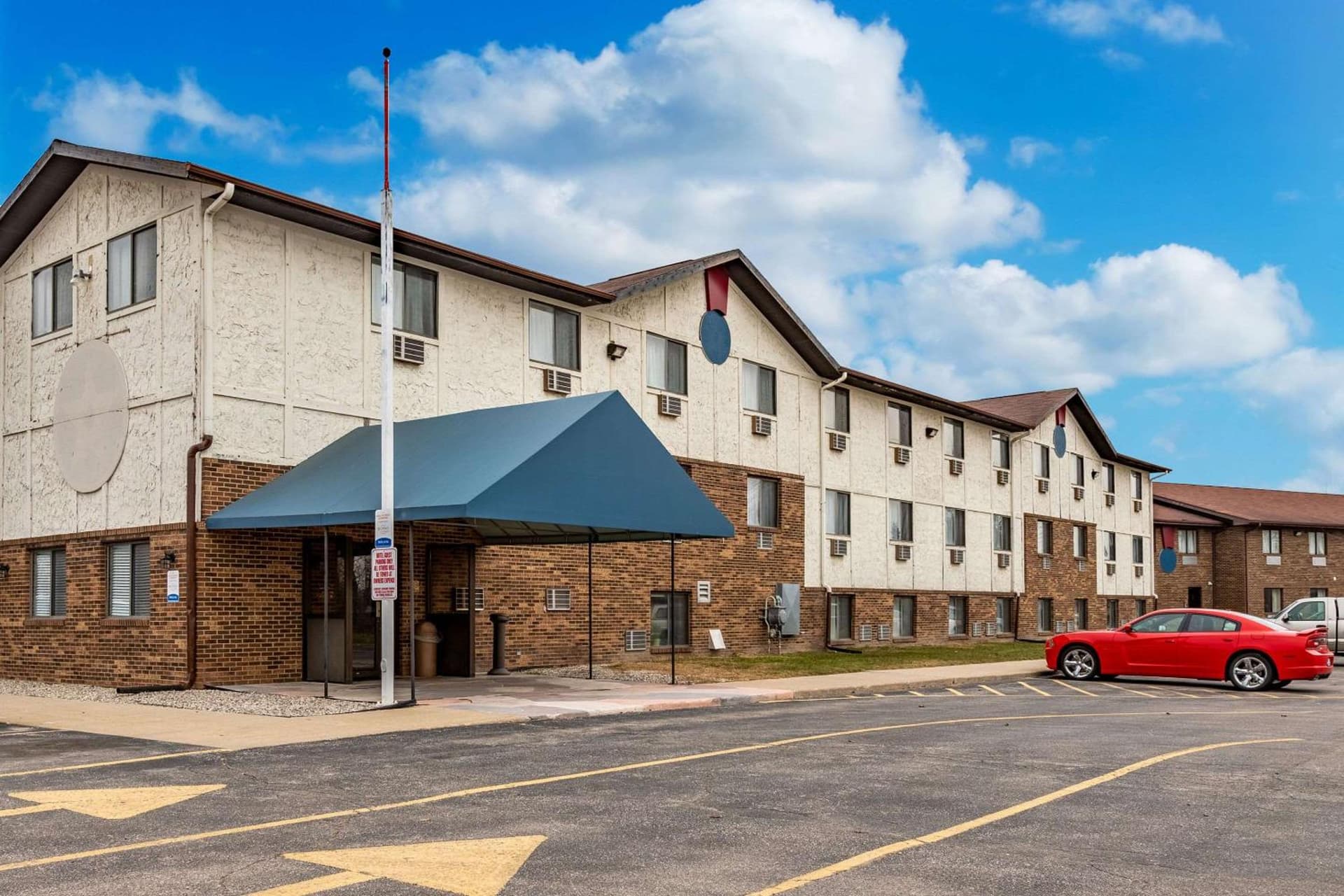 Econo Lodge Inn & Suites Auburn featured exterior or lobby in Auburn, MI — similar hotel