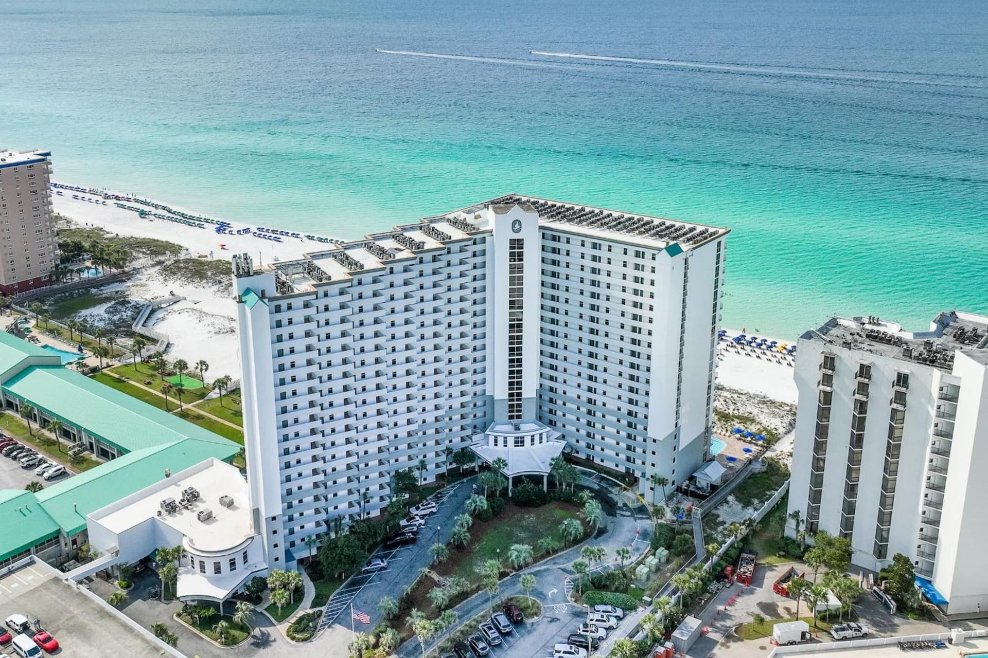 Pelican Beach Resort by Tufan featured exterior or lobby in Destin, FL — similar hotel
