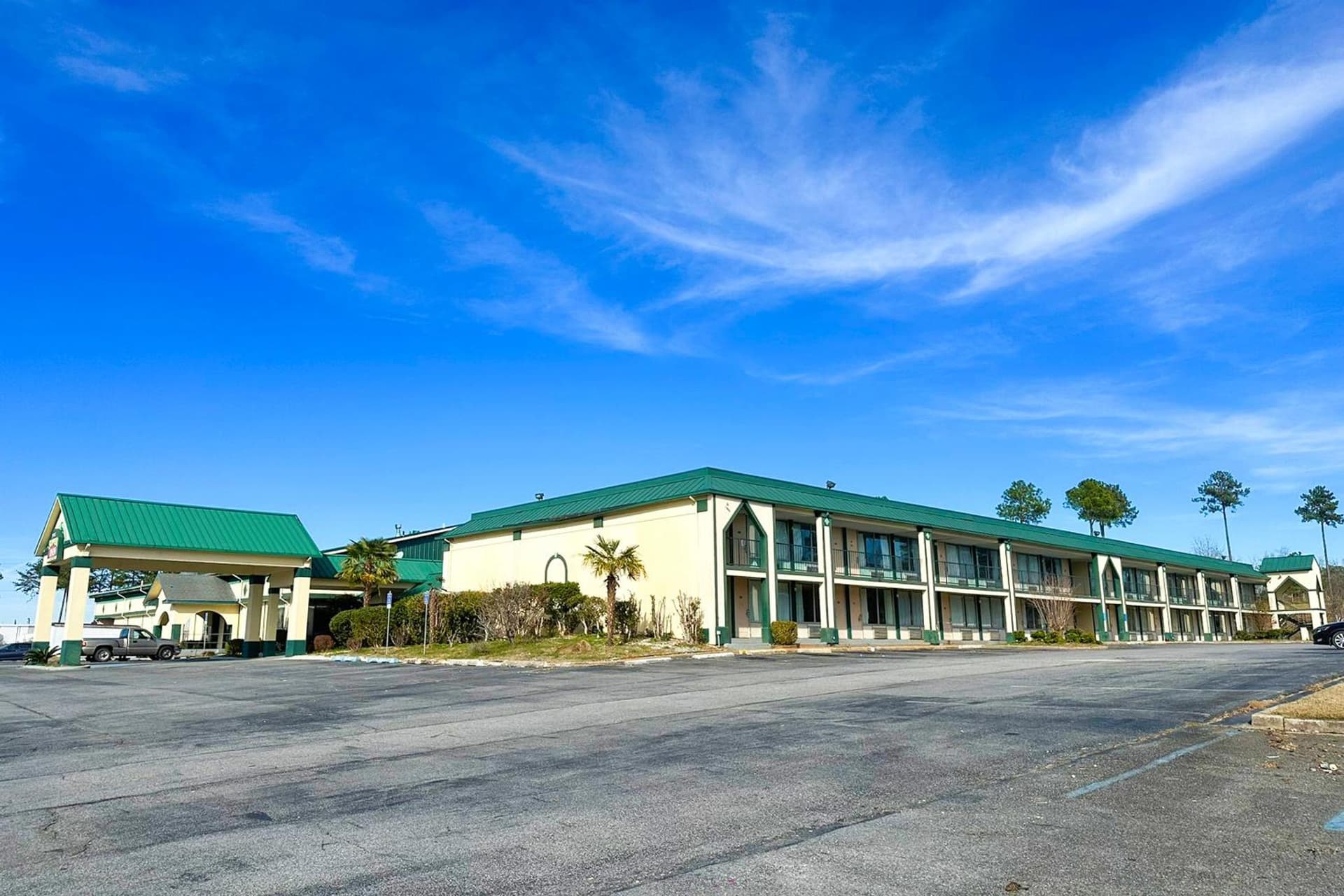 Super Inn & Suites by OYO Milledgeville featured exterior or lobby in Milledgeville, GA — similar hotel