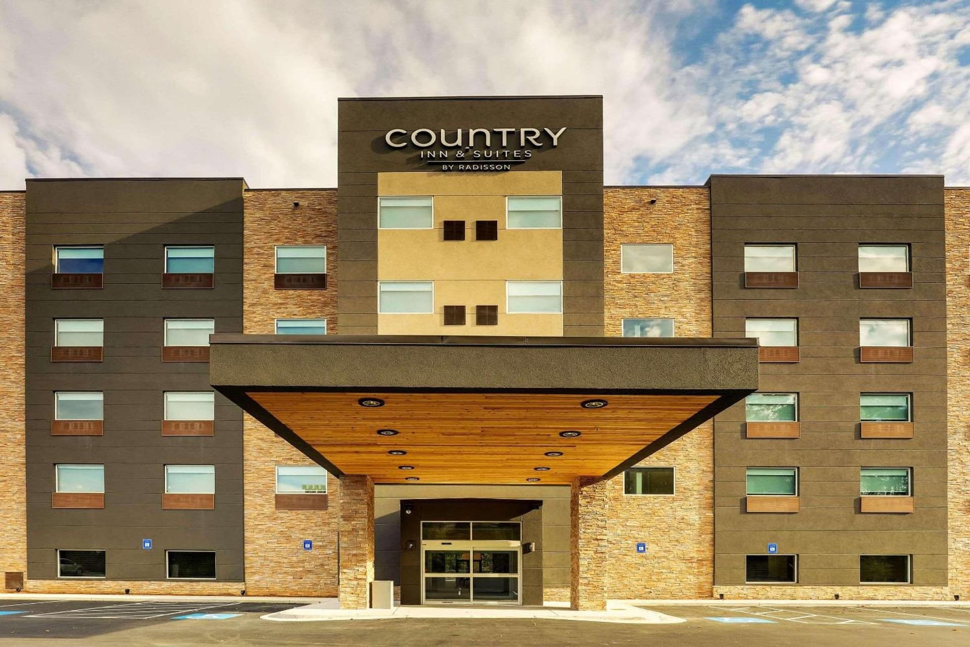 Country Inn & Suites by Radisson, Cumming near NorthSide Hospital Forsyth featured exterior or lobby in Cumming, GA — similar hotel