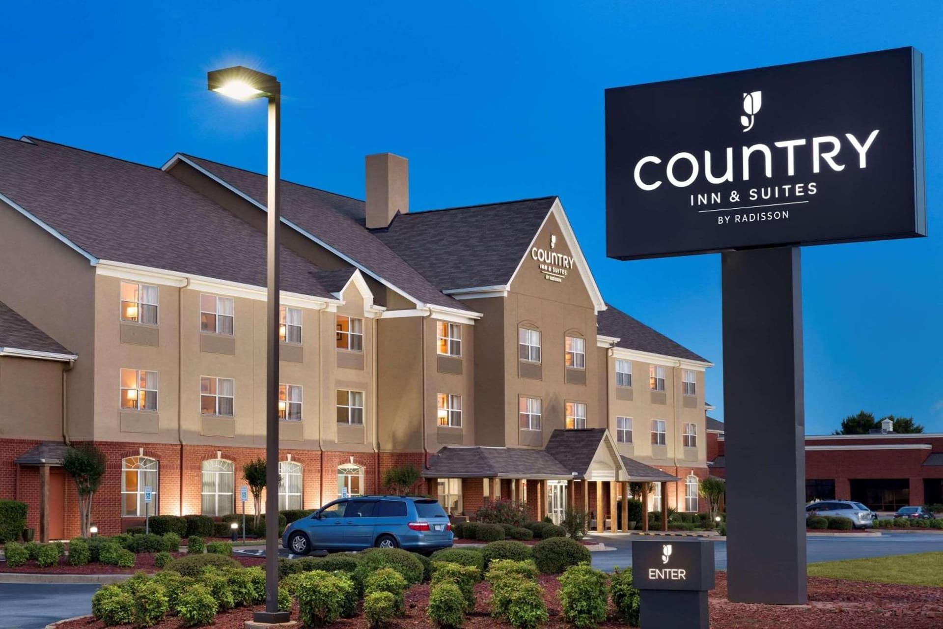 Country Inn & Suites by Radisson, Warner Robins, GA exterior or lobby in Warner Robins, GA — main listing photo