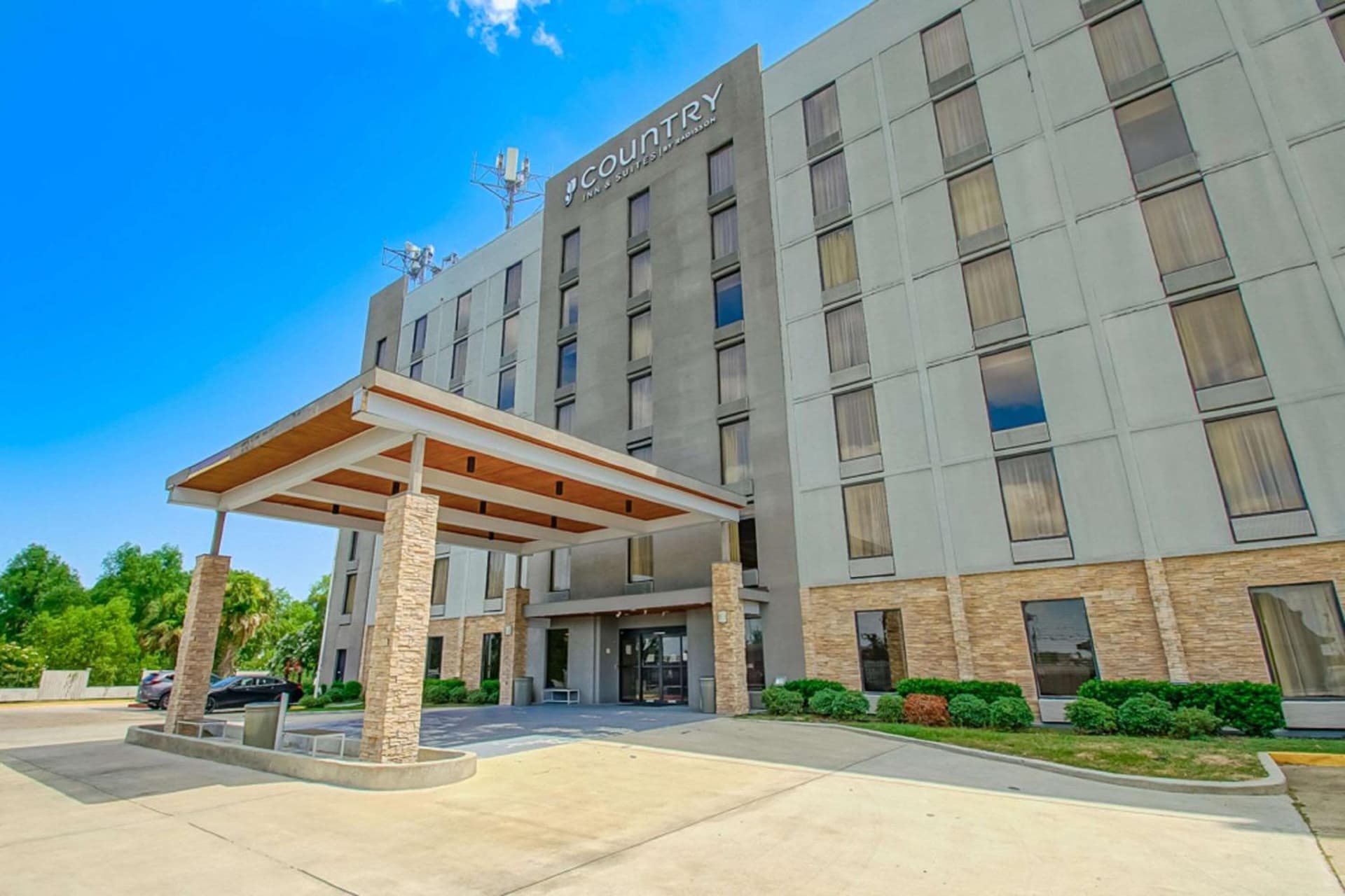 Country Inn & Suites by Radisson, New Orleans I-10 East, LA featured exterior or lobby in New Orleans, LA — similar hotel