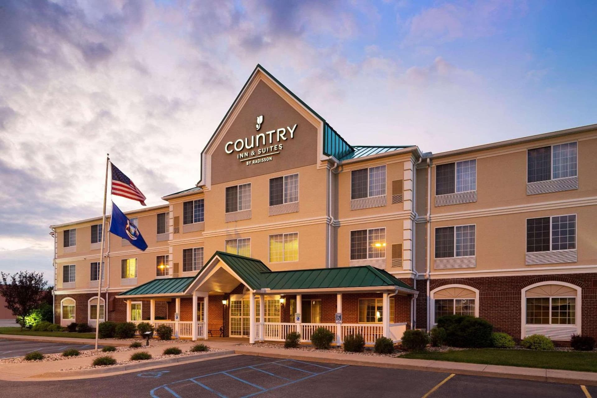 Country Inn & Suites by Radisson, Big Rapids, MI featured exterior or lobby in Big Rapids, MI — similar hotel