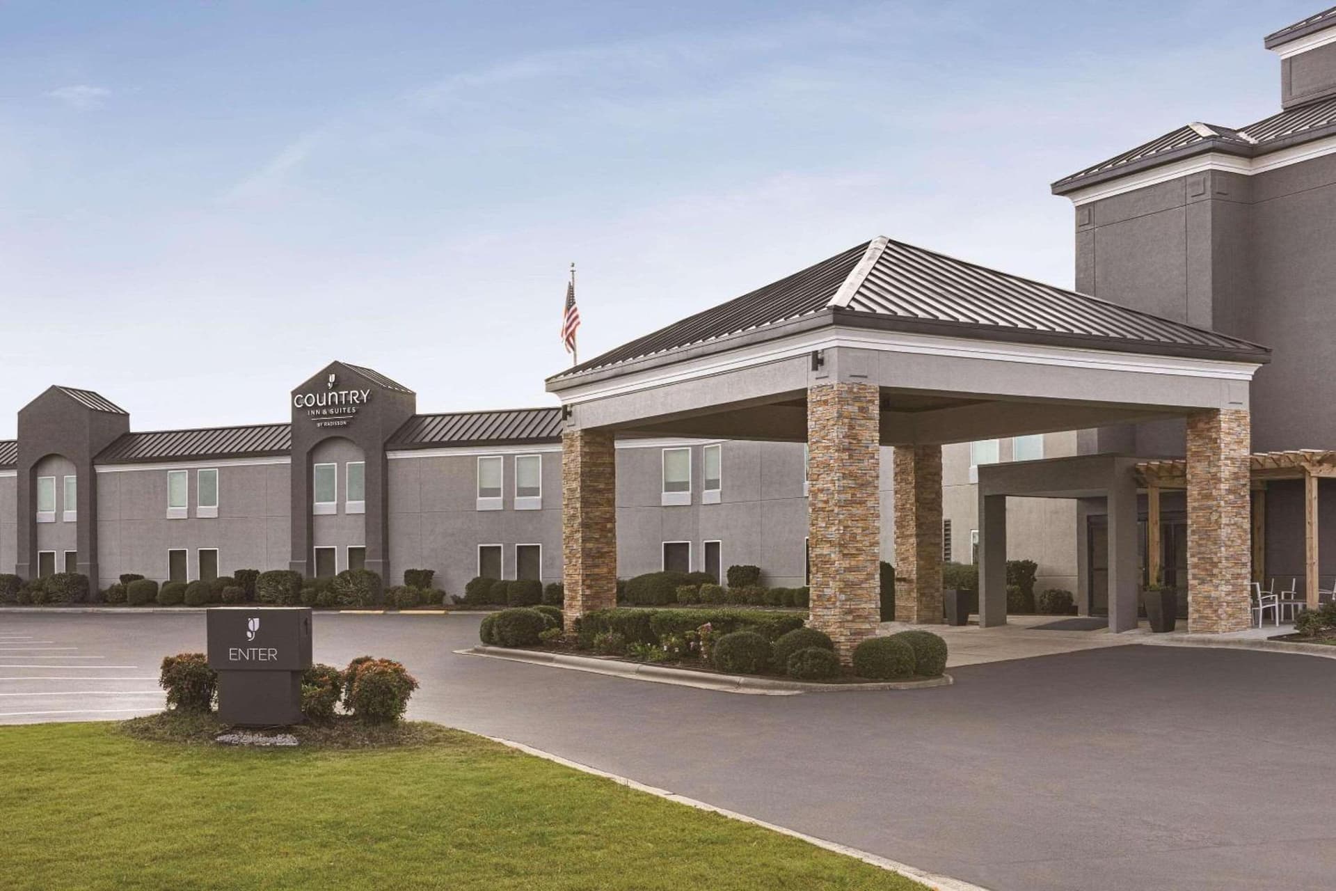 Country Inn & Suites by Radisson, Dunn I-95 featured exterior or lobby in Dunn, NC — similar hotel
