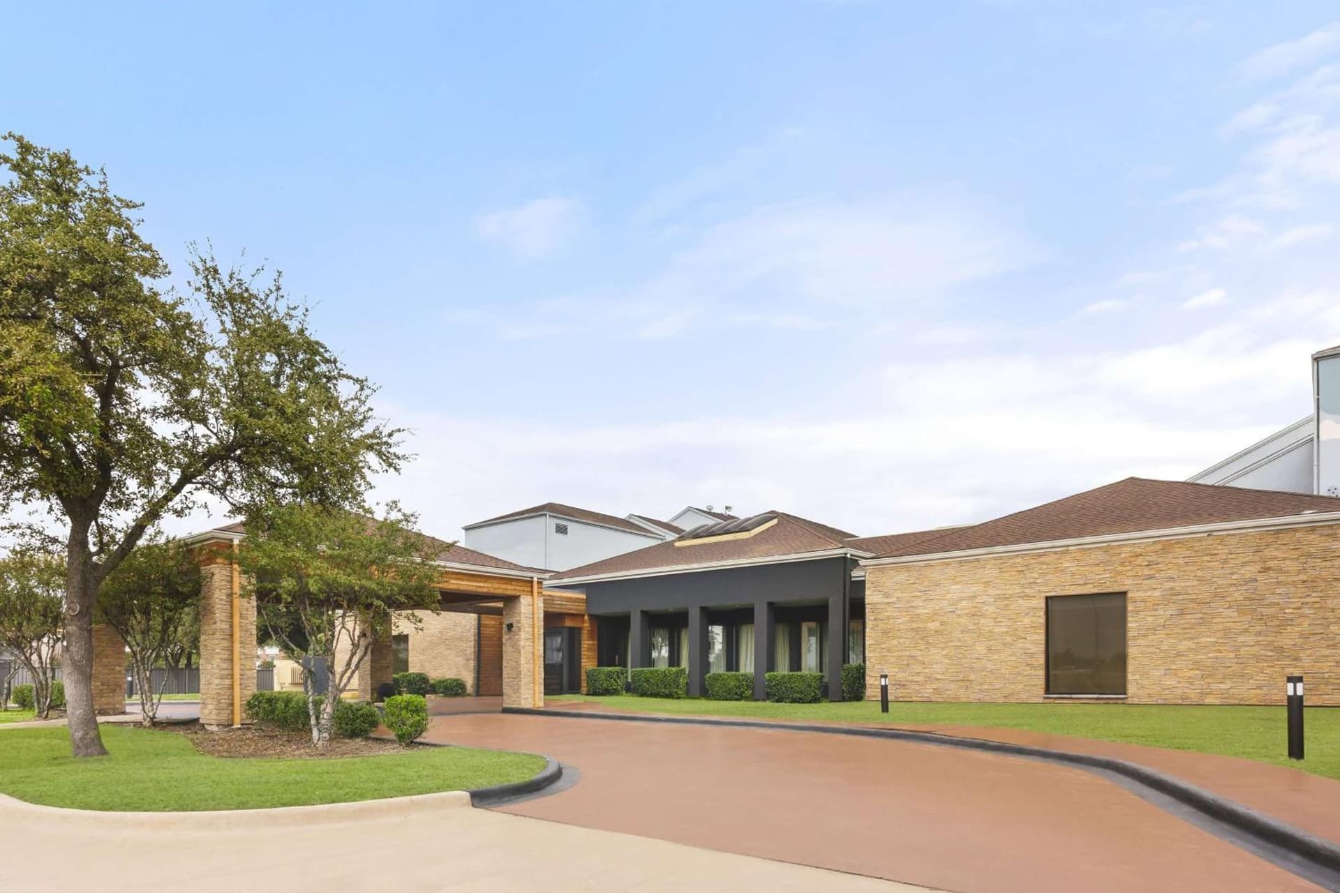 Super 8 by Wyndham Dallas Love Field Airport featured exterior or lobby in Dallas, TX — similar hotel