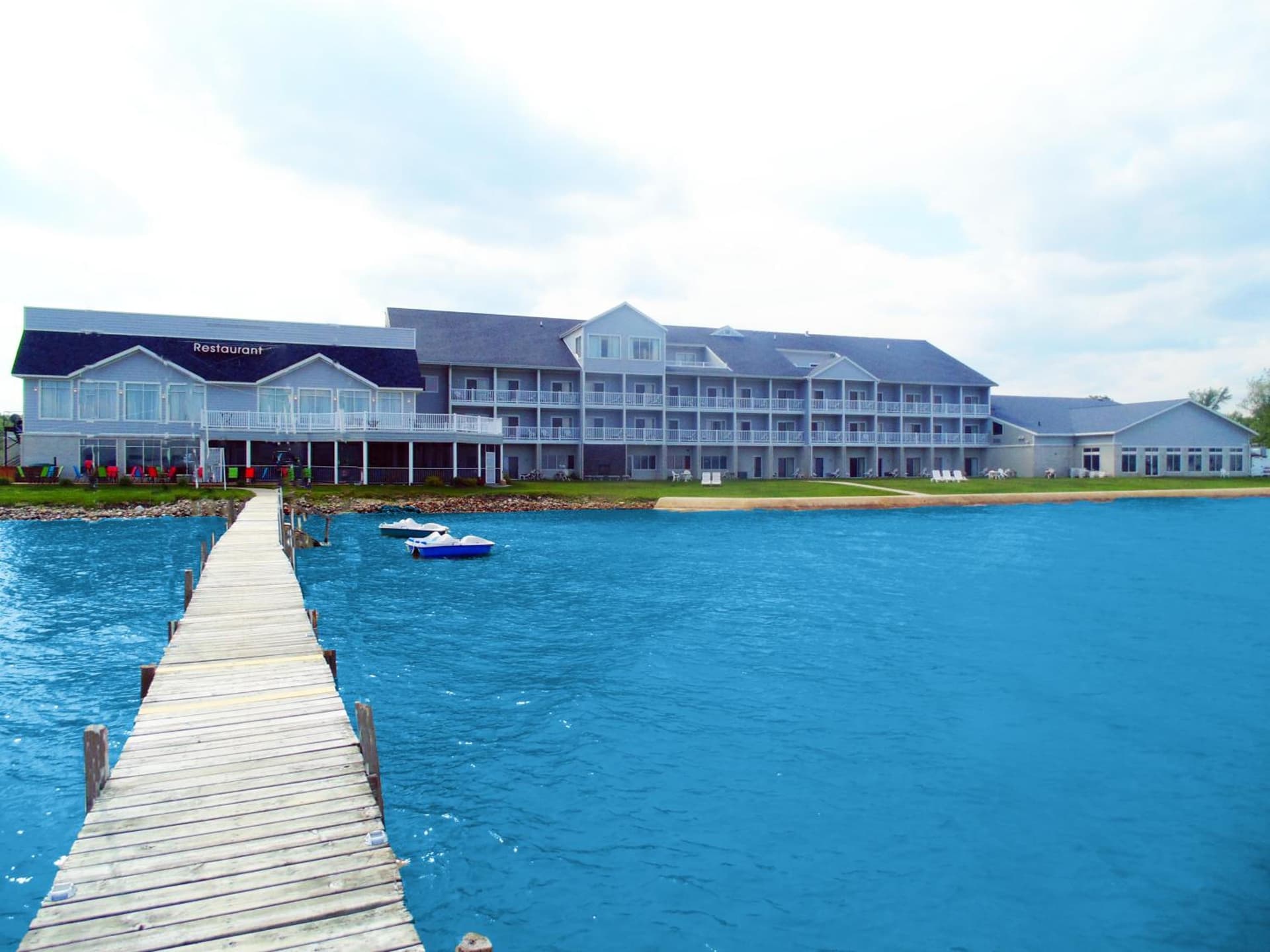 Lakeside Resort & Conference Center featured exterior or lobby in Houghton Lake, MI — similar hotel