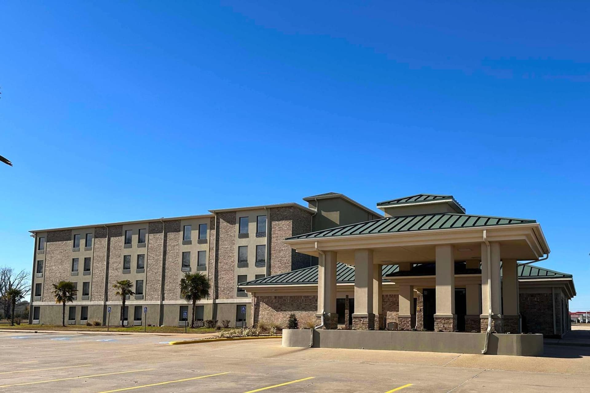 Super 8 by Wyndham Alexandria LA featured exterior or lobby in Alexandria, LA — similar hotel