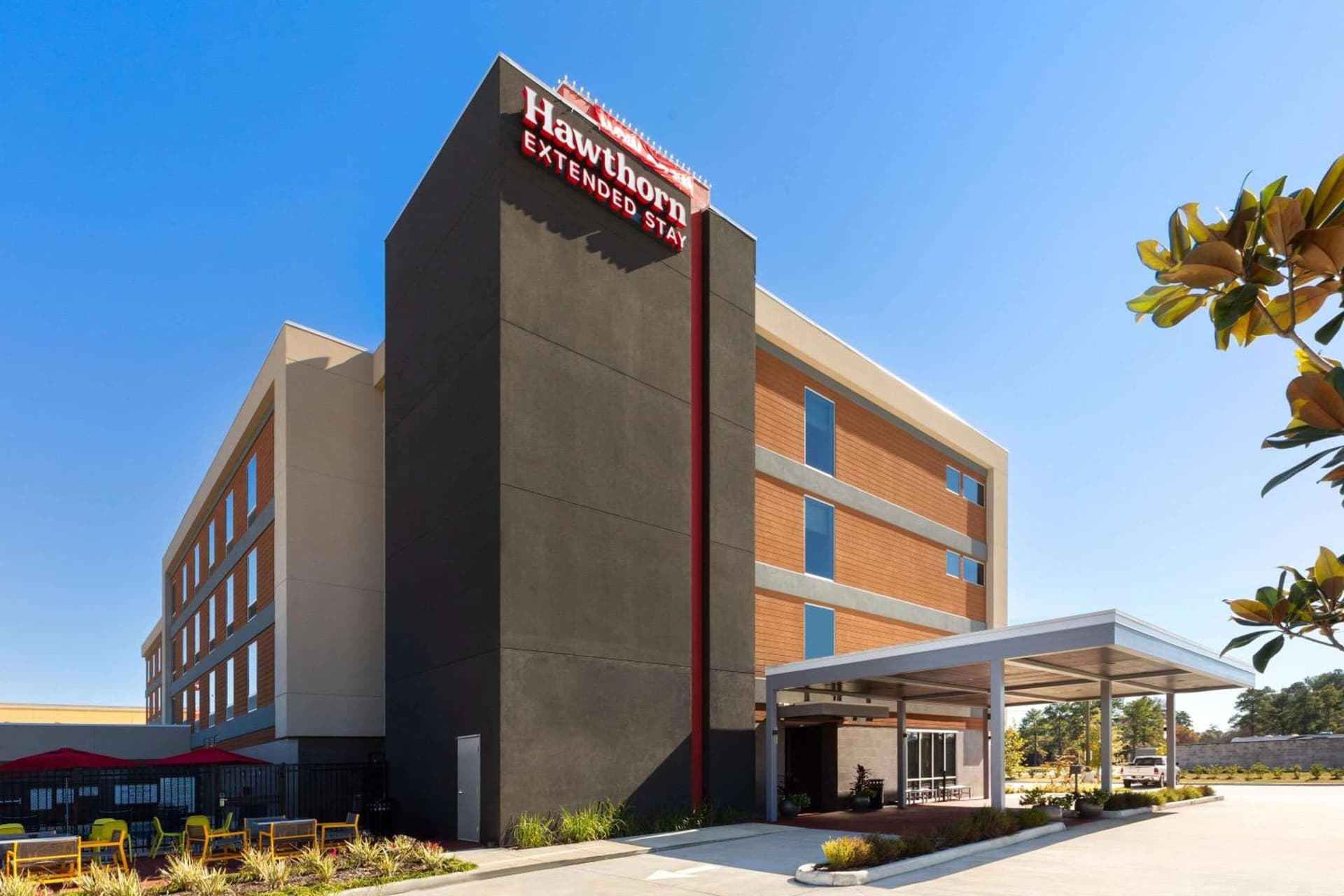 Hawthorn Extended Stay by Wyndham Kingwood Houston featured exterior or lobby in Kingwood, TX — similar hotel