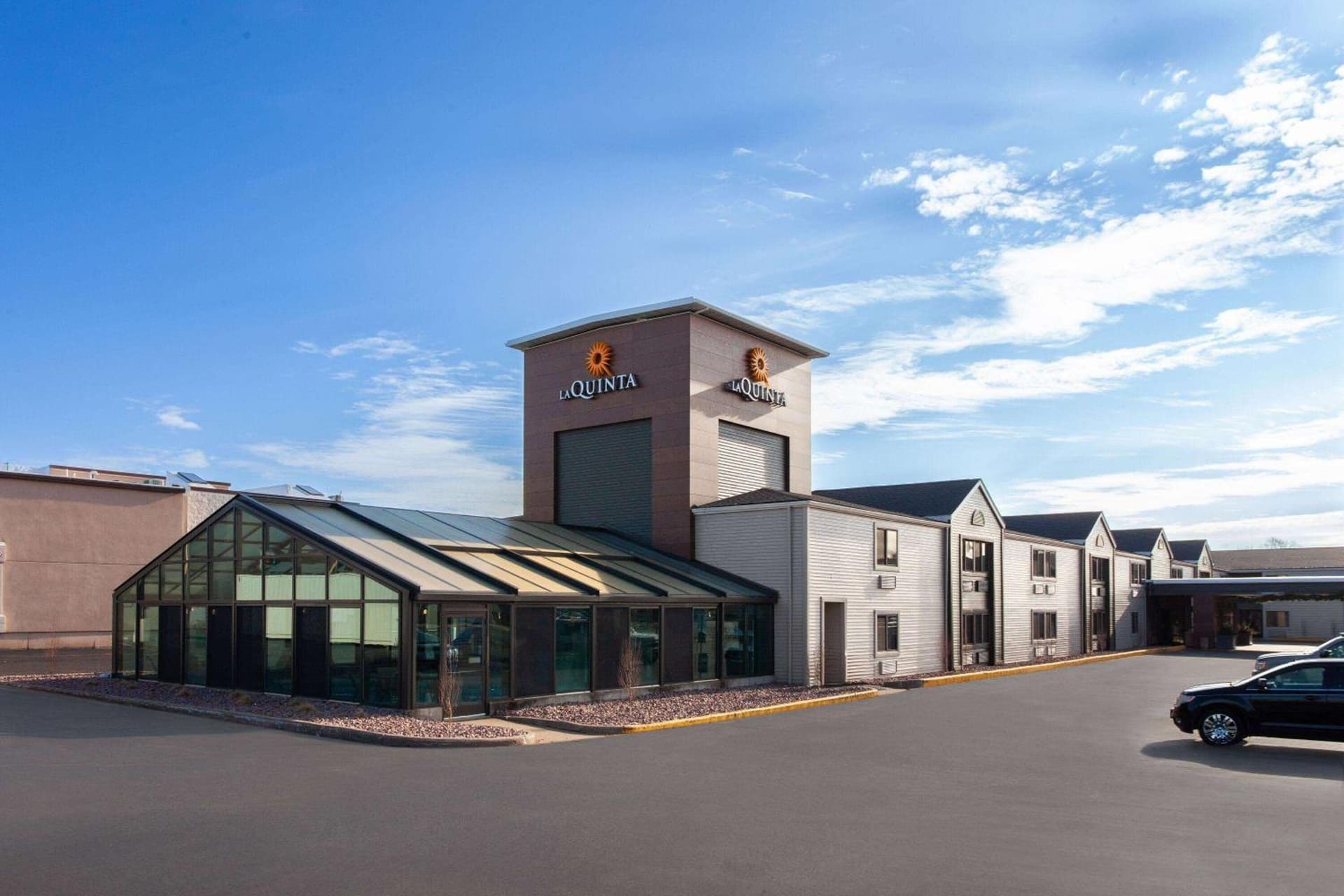 La Quinta Inn by Wyndham Wausau featured exterior or lobby in Wausau, WI — similar hotel