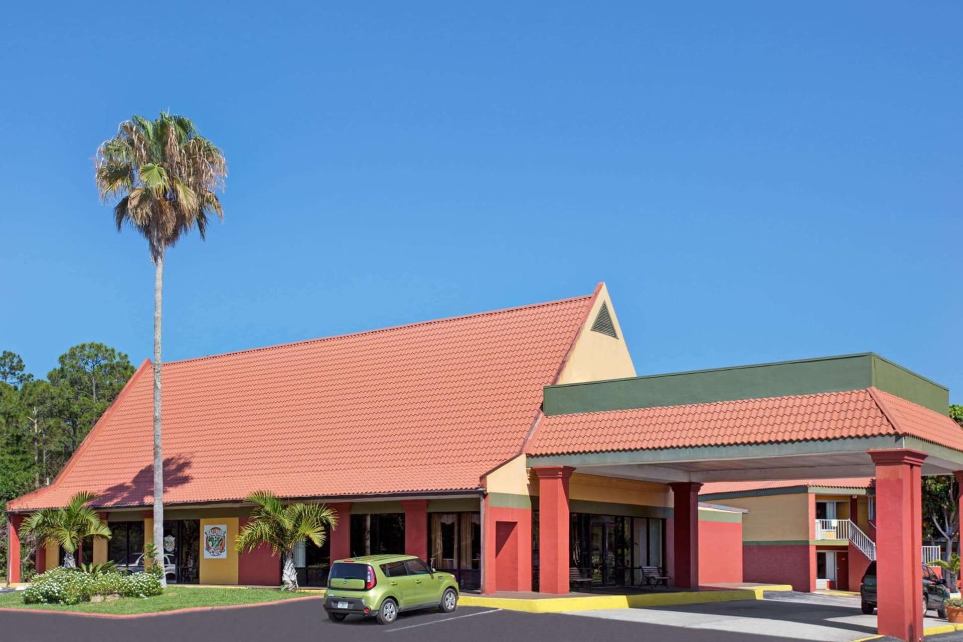 Days Inn by Wyndham Cocoa Cruiseport West At I-95/524 featured exterior or lobby in Cocoa, FL — similar hotel