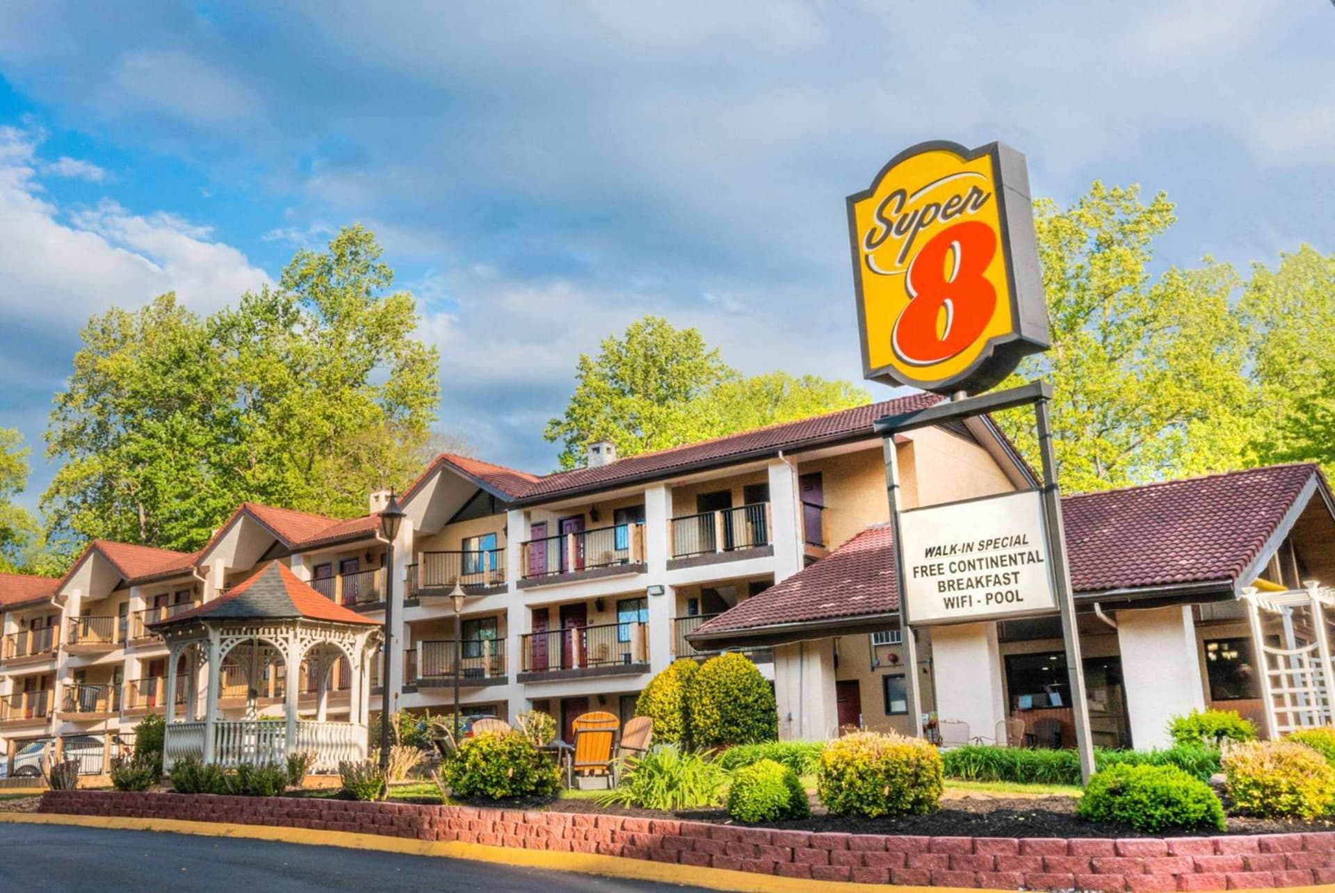 Super 8 by Wyndham Downtown Gatlinburg at Convention Center featured exterior or lobby in Gatlinburg, TN — similar hotel