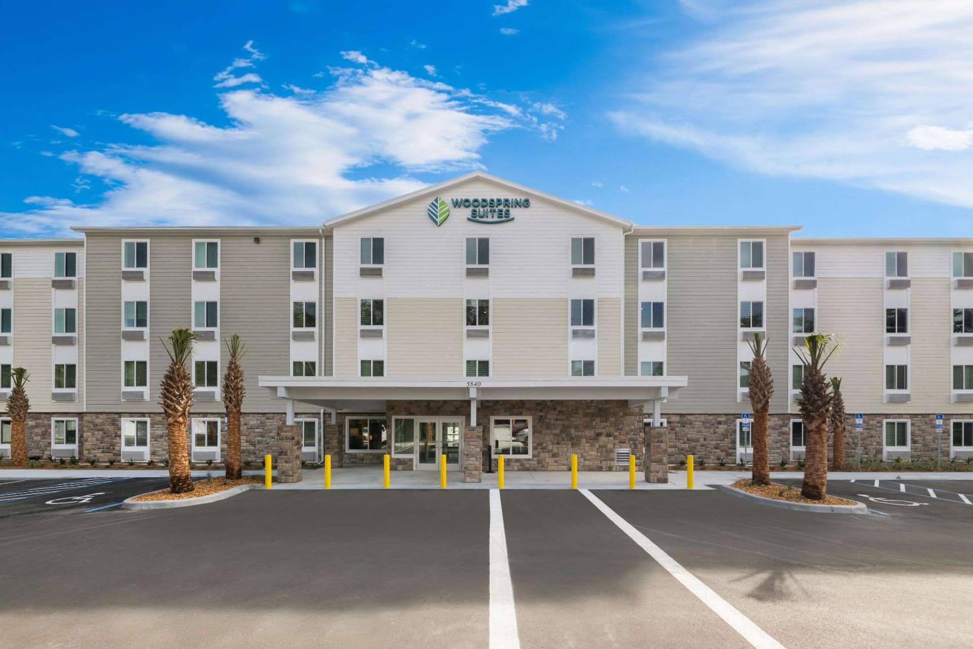 WoodSpring Suites Port Orange - Daytona Beach featured exterior or lobby in Port Orange, FL — similar hotel