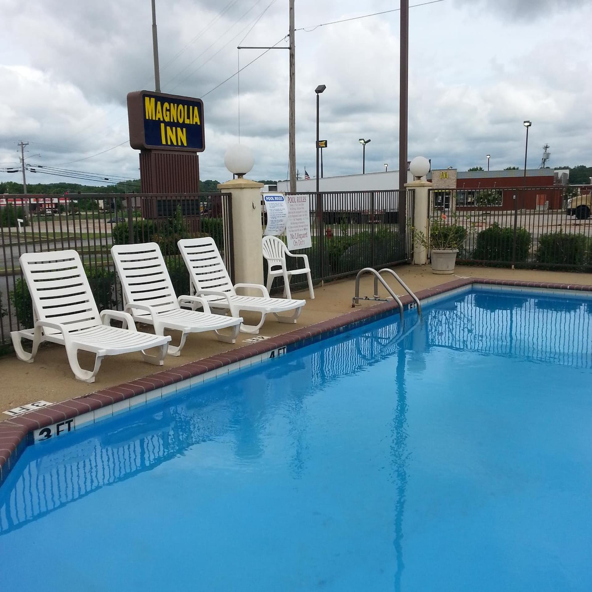 Magnolia Inn featured exterior or lobby in Holly Springs, MS — similar hotel