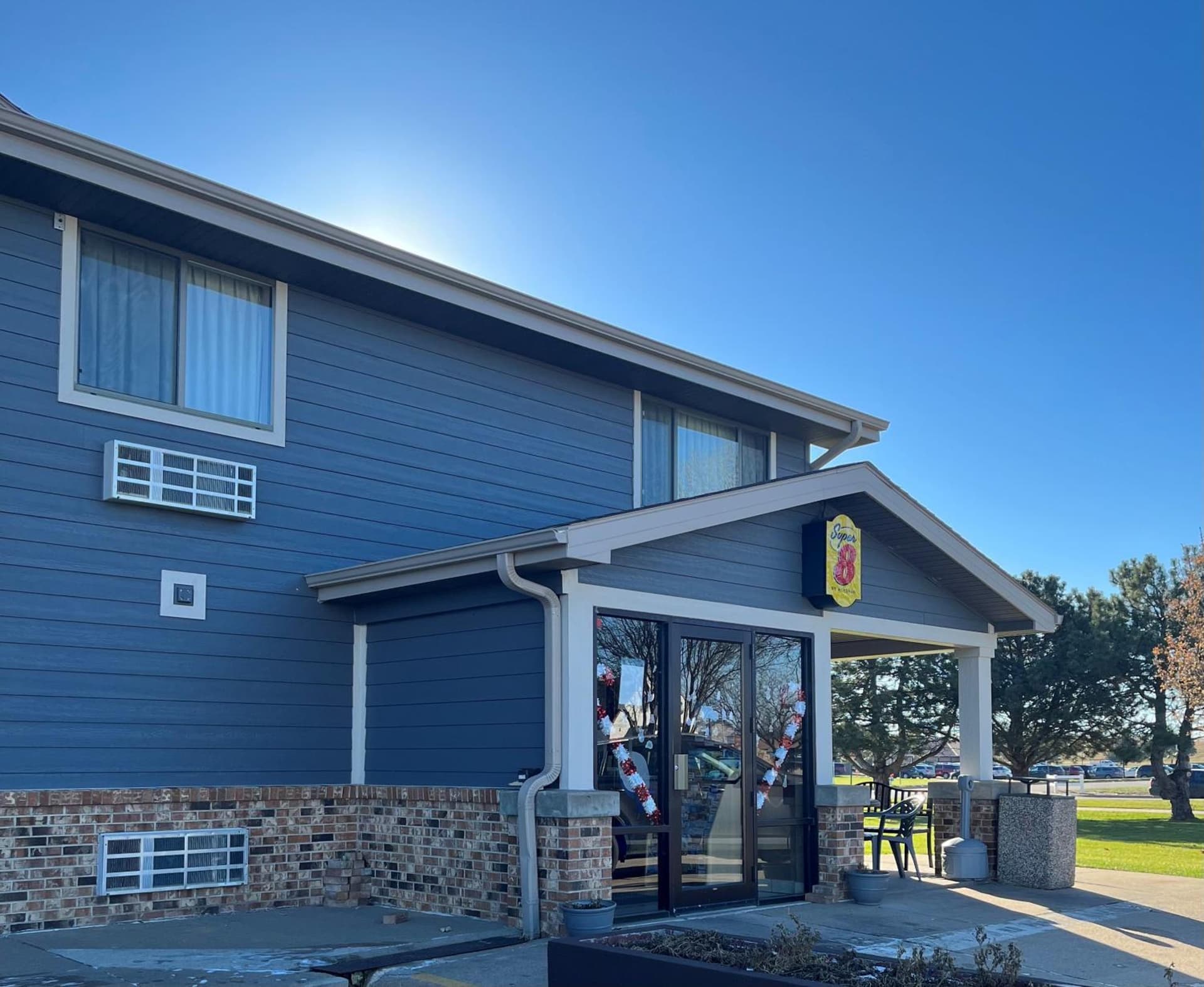 Super 8 by Wyndham Hastings featured exterior or lobby in Hastings, NE — similar hotel