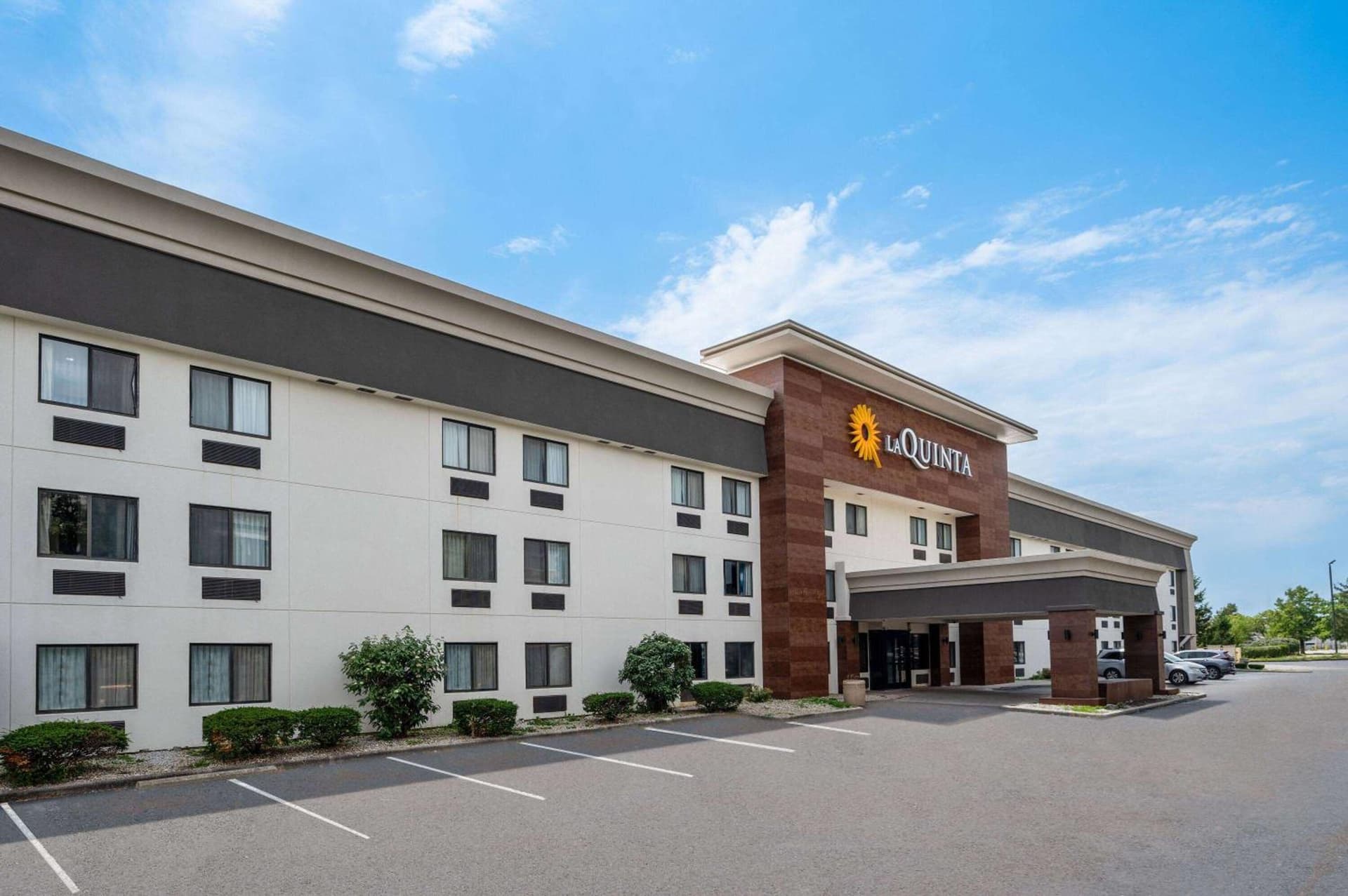La Quinta Inn by Wyndham Indianapolis Airport Executive Dr featured exterior or lobby in Indianapolis, IN — similar hotel