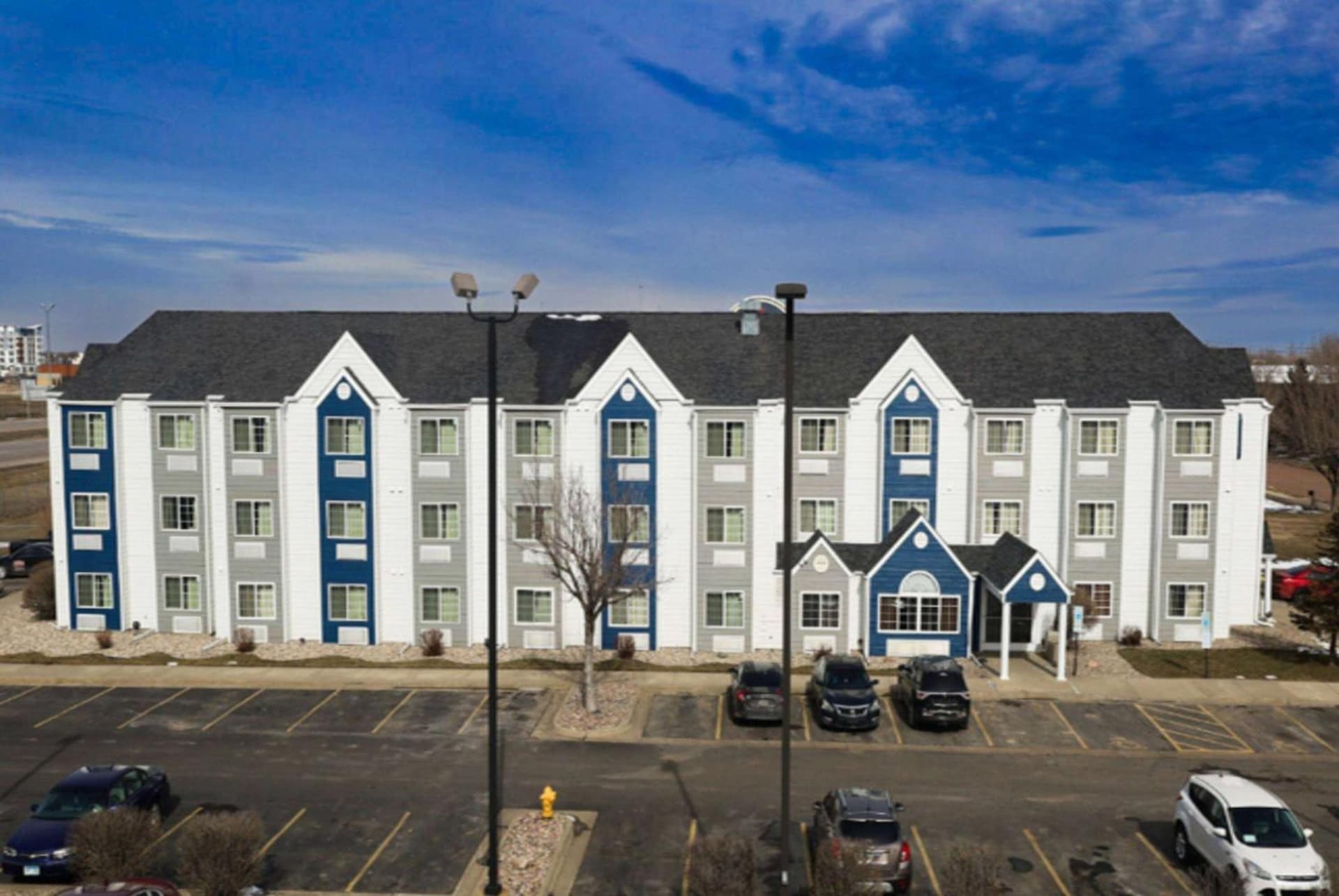 Microtel Inn & Suites by Wyndham Sioux Falls featured exterior or lobby in Sioux Falls, SD — similar hotel