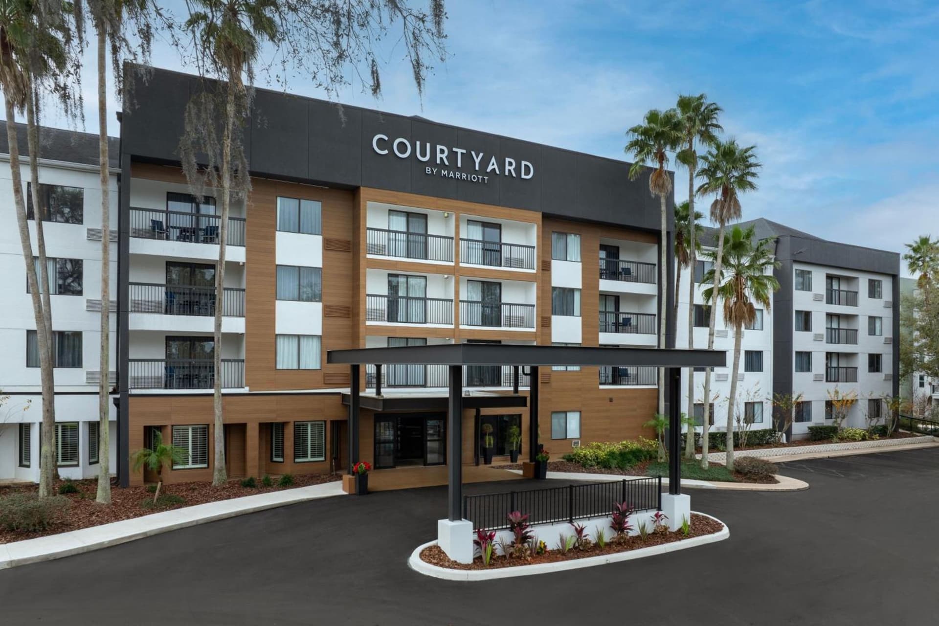 Courtyard by Marriott Orlando East/UCF Area featured exterior or lobby in Orlando, FL — similar hotel