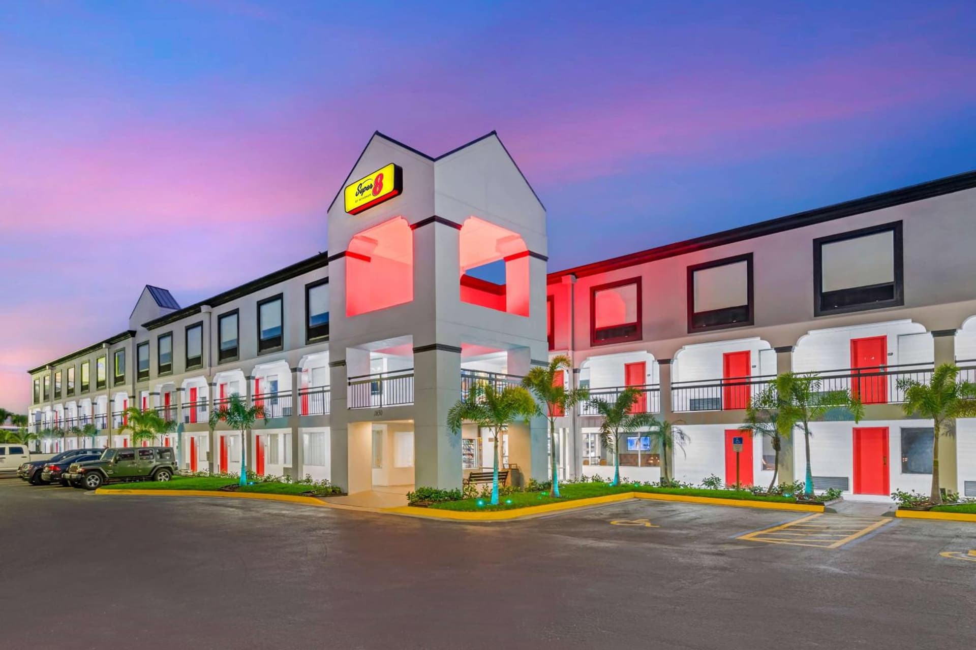 Super 8 by Wyndham Orlando Near Florida Mall featured exterior or lobby in Orlando, FL — similar hotel