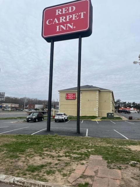 Red Carpet Inn Quantico featured exterior or lobby in Dumfries, VA — similar hotel