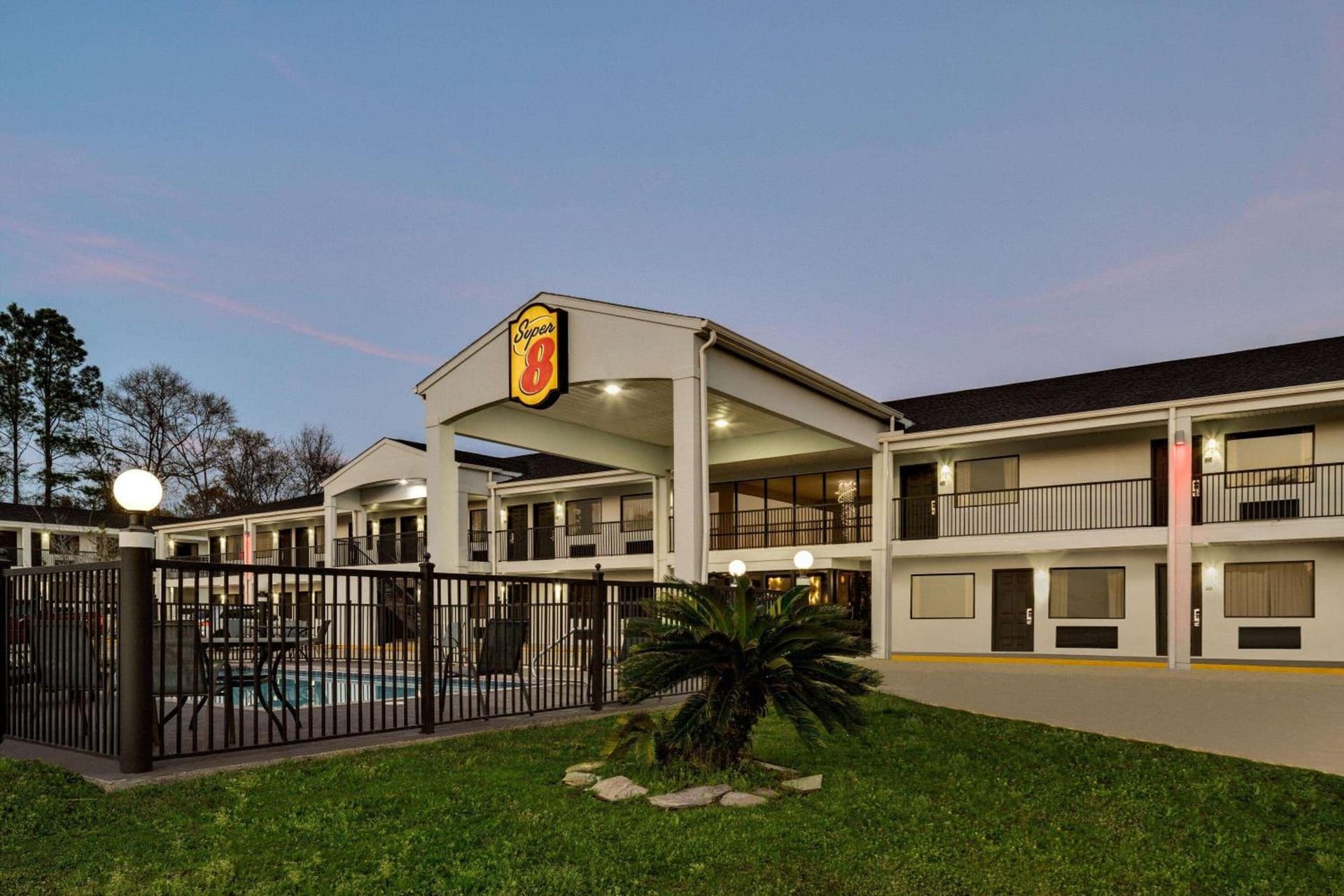 Super 8 by Wyndham Ocean Springs Biloxi featured exterior or lobby in Ocean Springs, MS — similar hotel
