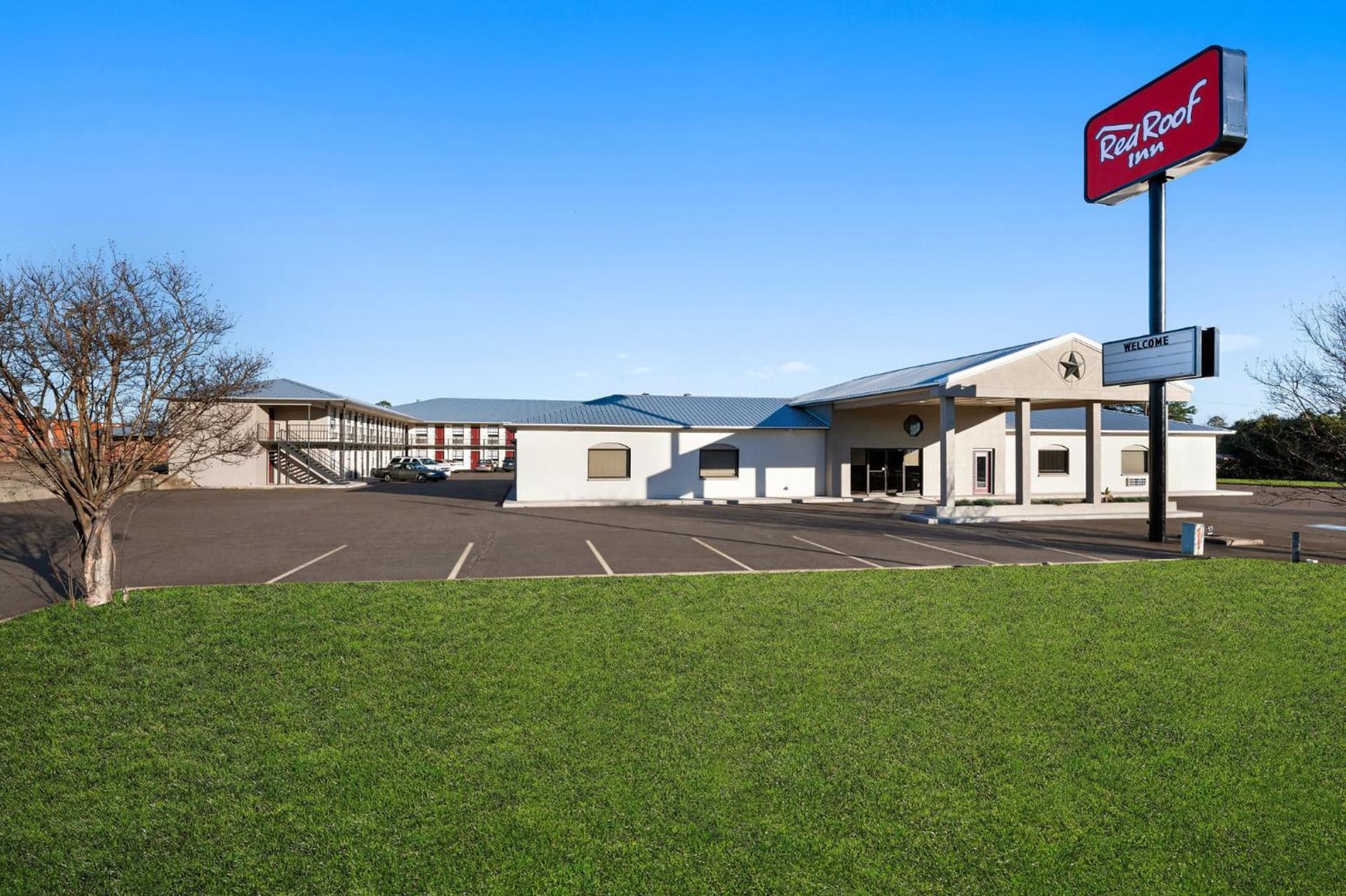 Red Roof Inn Nacogdoches featured exterior or lobby in Nacogdoches, TX — similar hotel