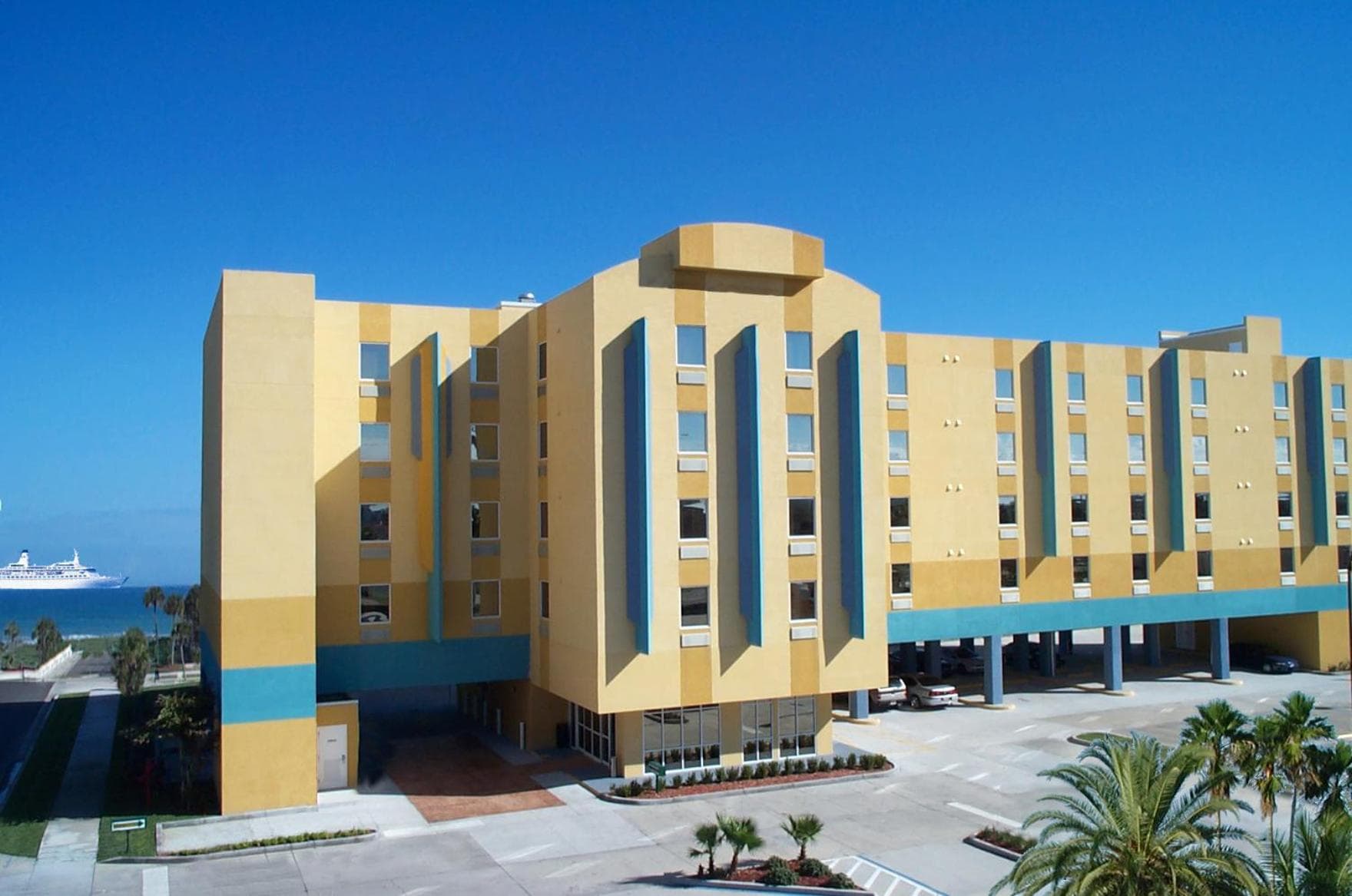 Cocoa Beach Suites Hotel featured exterior or lobby in Cocoa Beach, FL — similar hotel