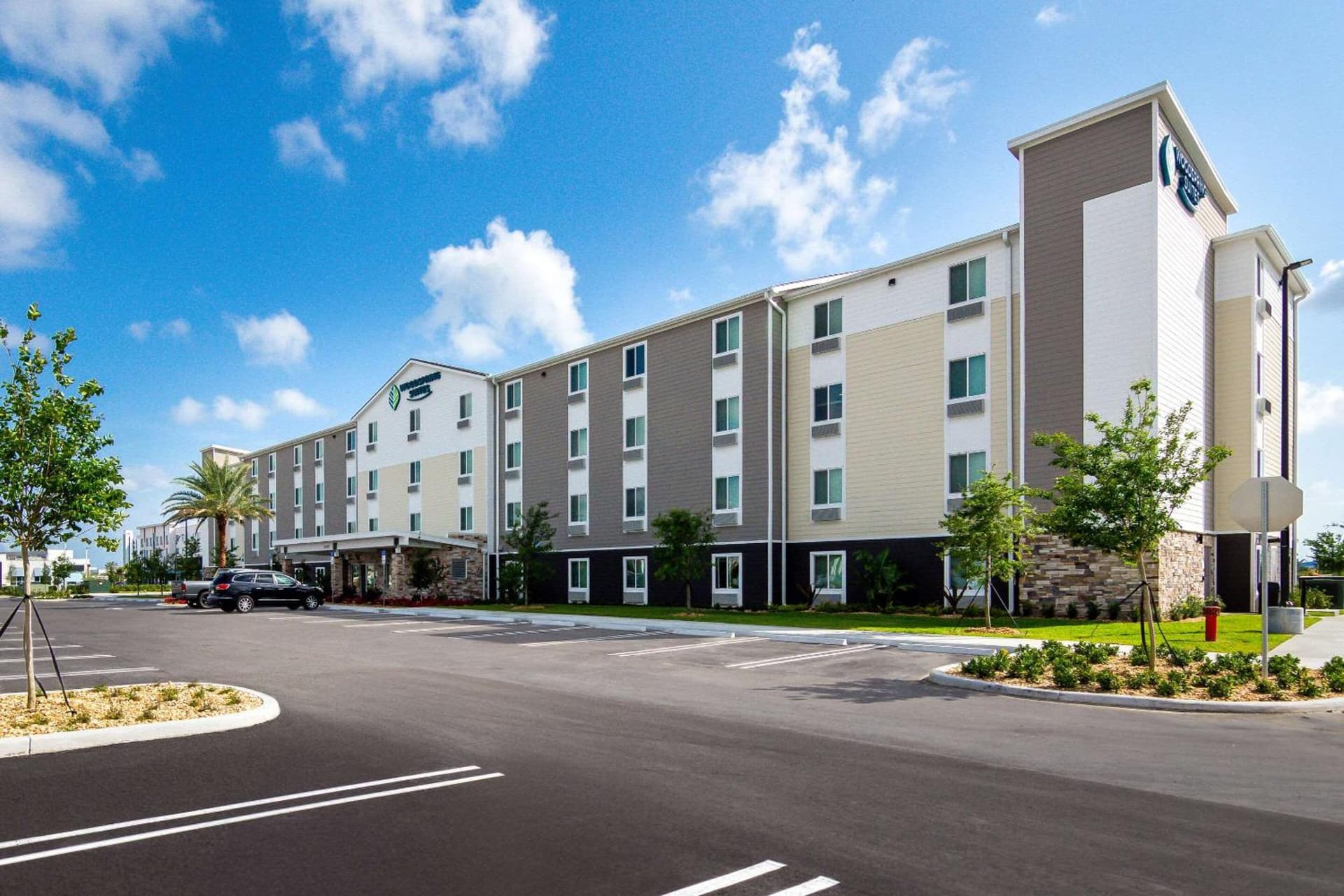 WoodSpring Suites Port St Lucie featured exterior or lobby in Port Saint Lucie, FL — similar hotel