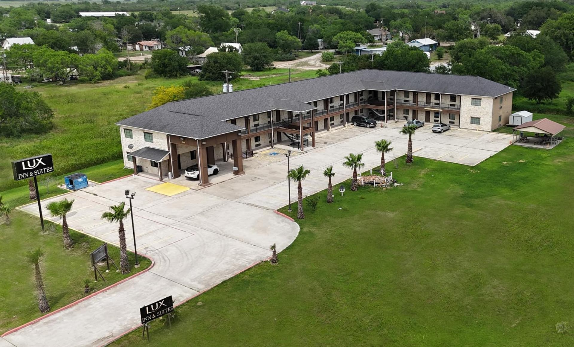 Lux Inn and Suites featured exterior or lobby in Three Rivers, TX — similar hotel