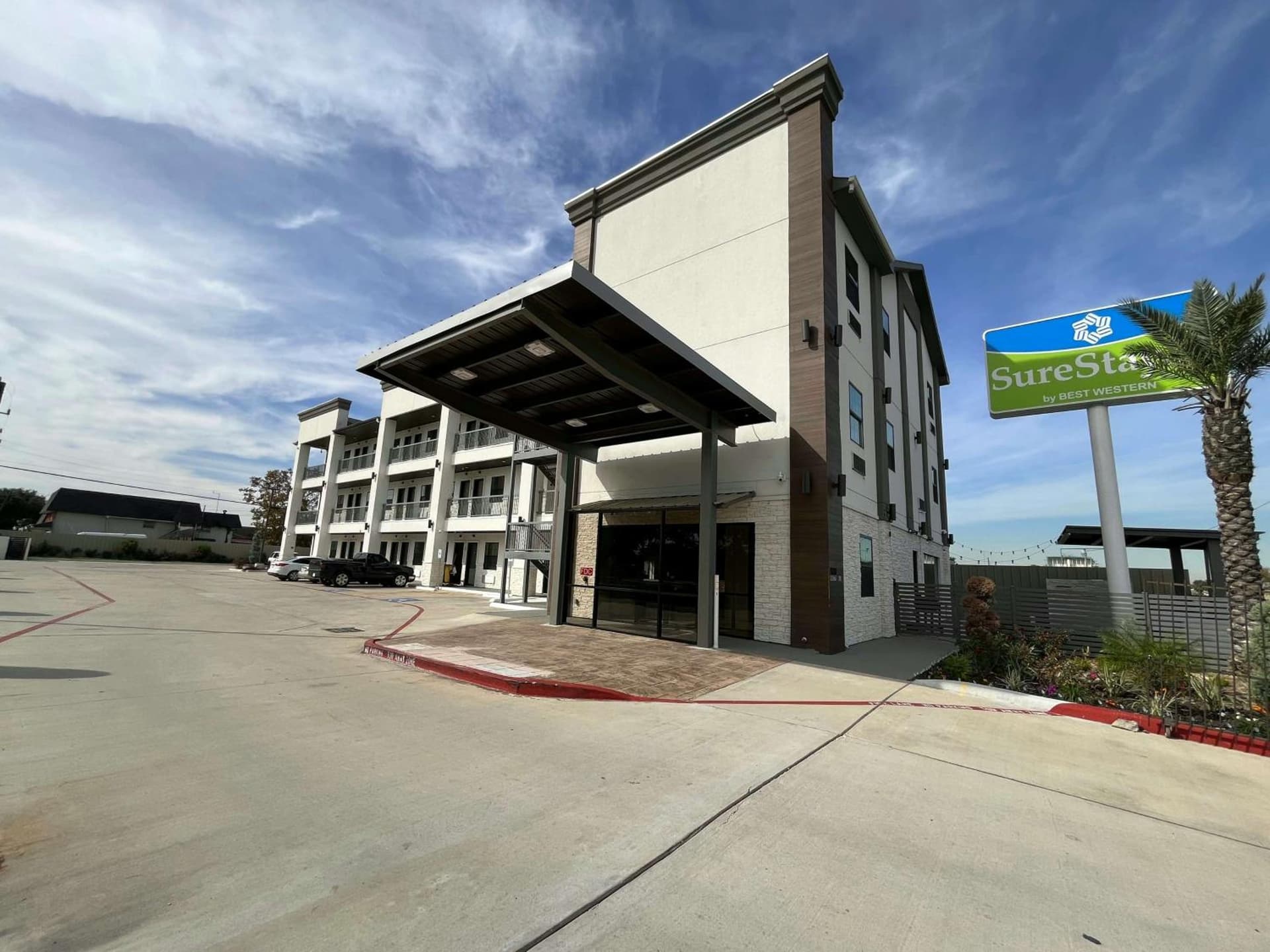 Comfeeni Inn and Suites featured exterior or lobby in Houston, TX — similar hotel