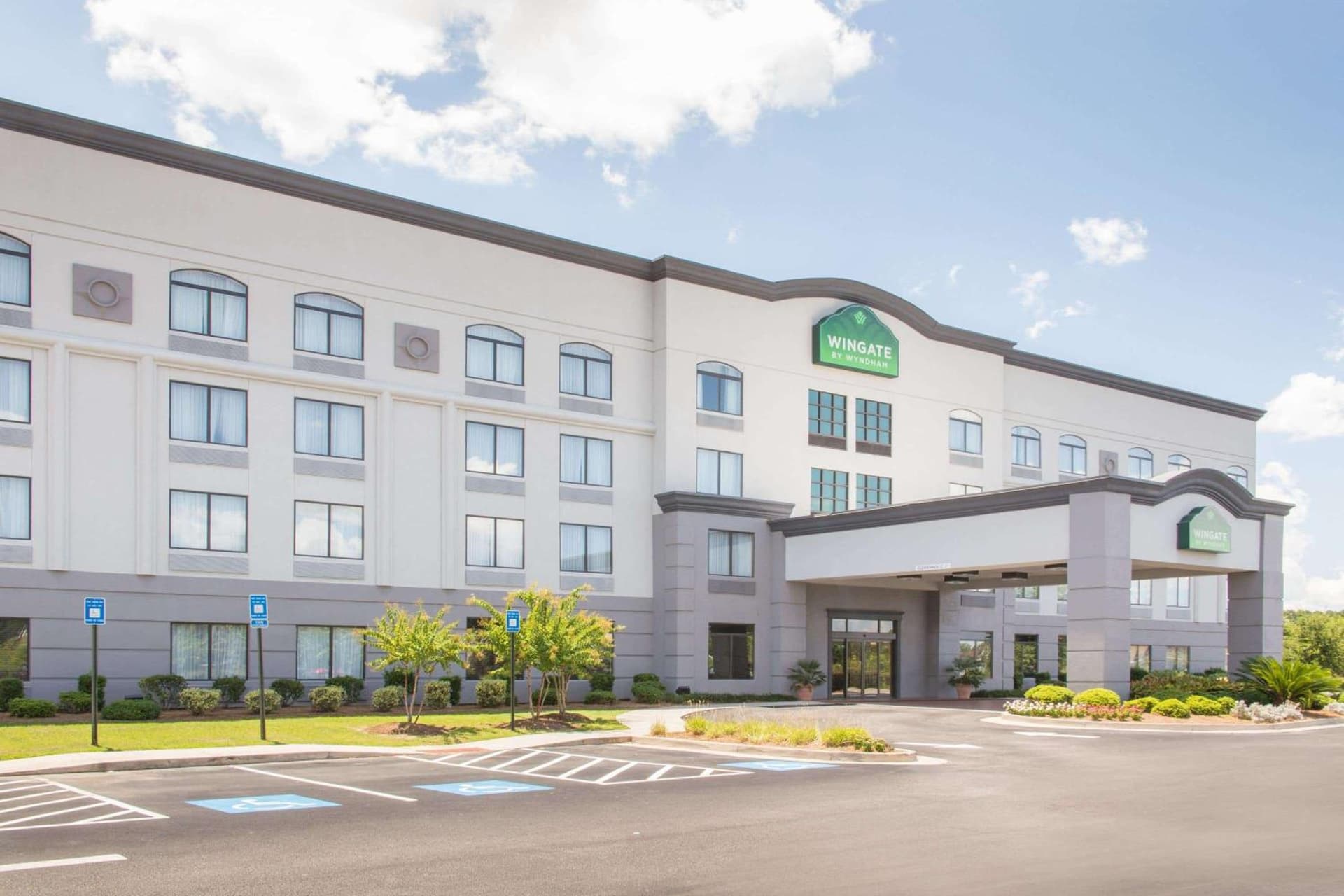 Wingate by Wyndham Savannah Pooler featured exterior or lobby in Savannah, GA — similar hotel