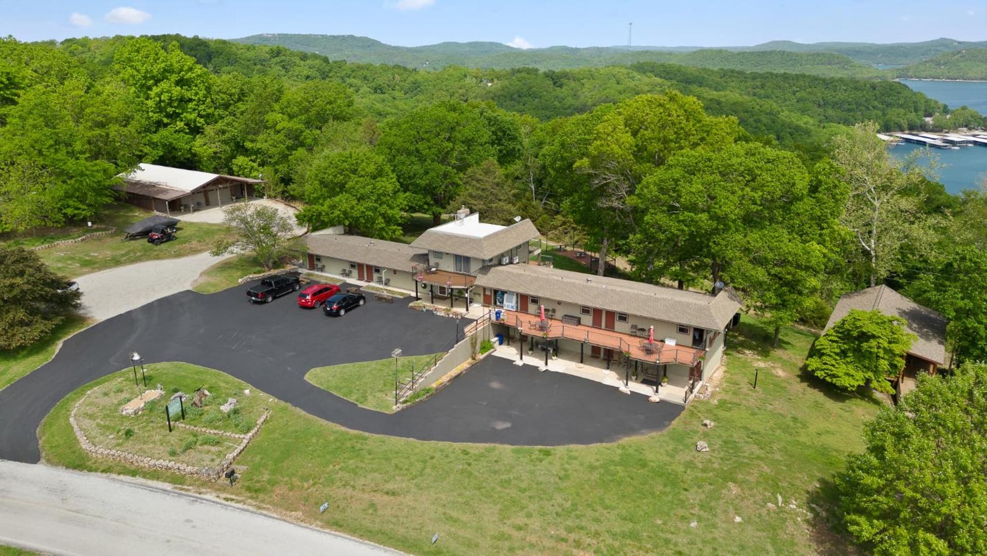 Roadrunner Inn and Log Cabins featured exterior or lobby in Eureka Springs, AR — similar hotel