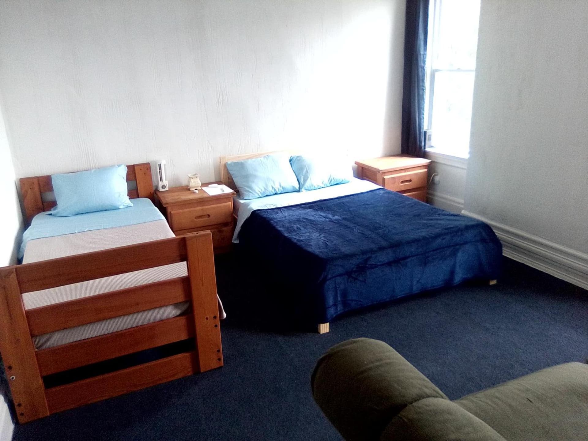 A cozy bedroom for you to relax interior in Pittsburgh, PA — gallery photo 2