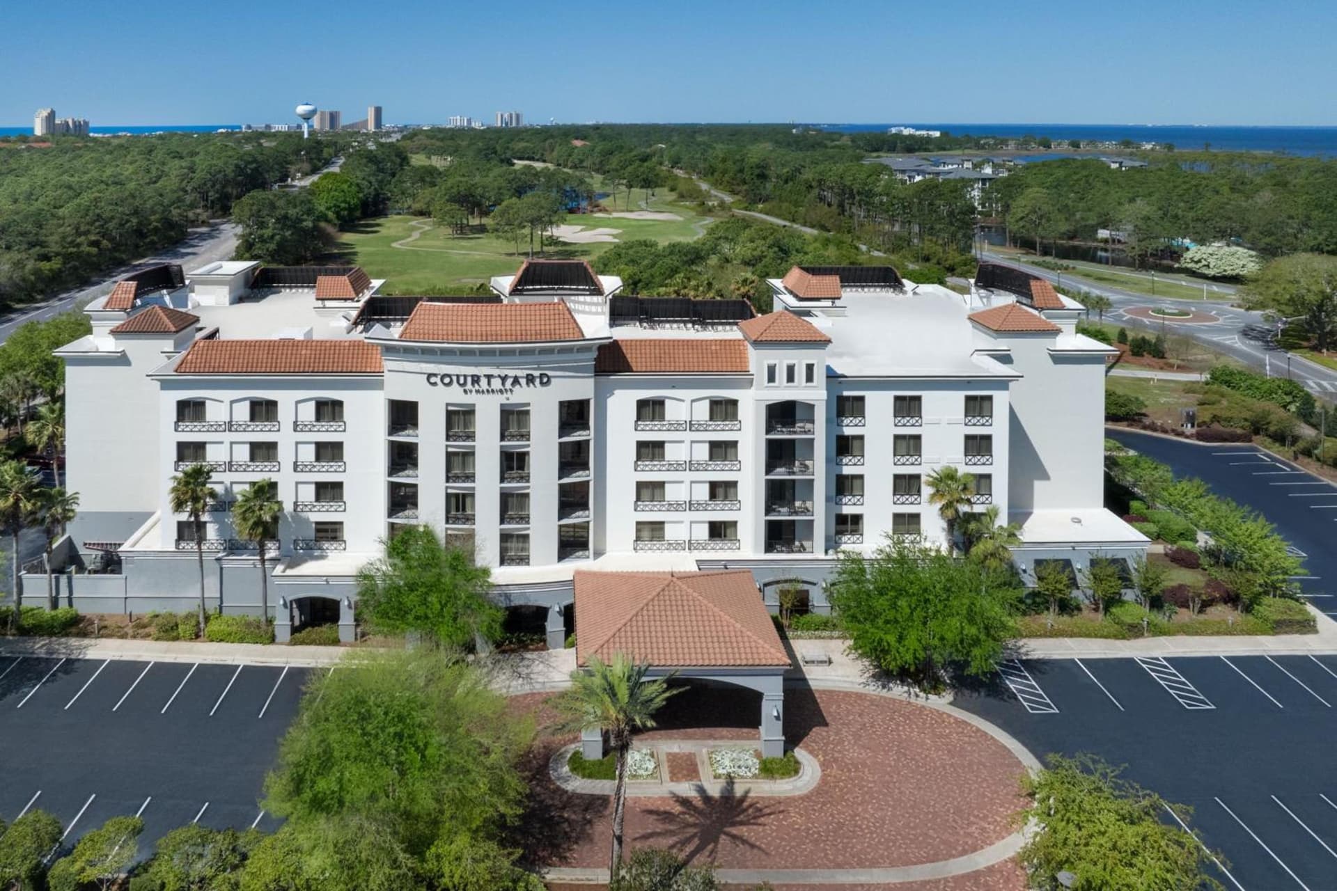 Courtyard by Marriott Sandestin at Grand Boulevard featured exterior or lobby in Destin, FL — similar hotel