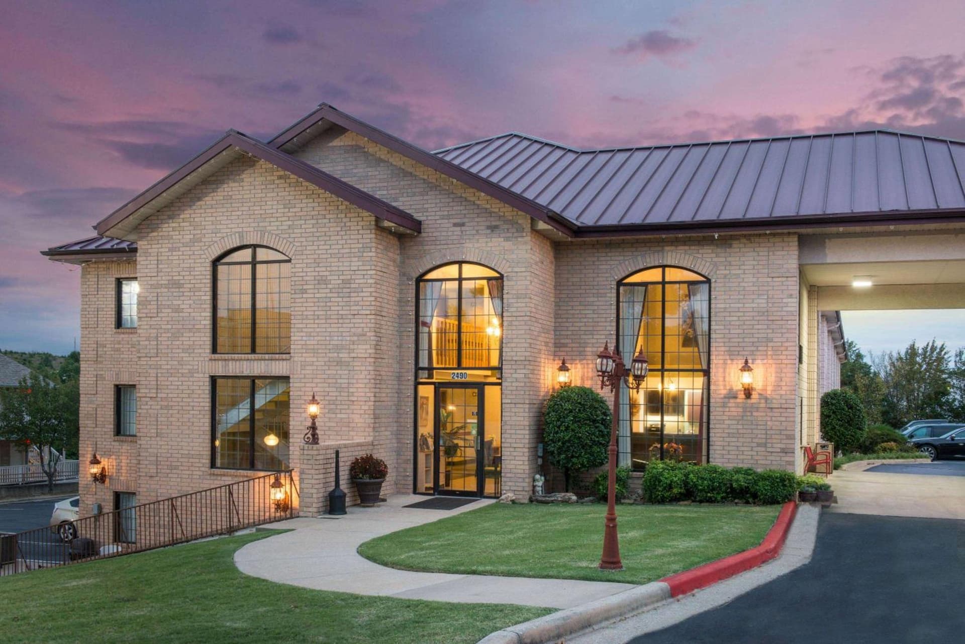 Super 8 by Wyndham Branson Andy Williams Theatre featured exterior or lobby in Branson, MO — similar hotel